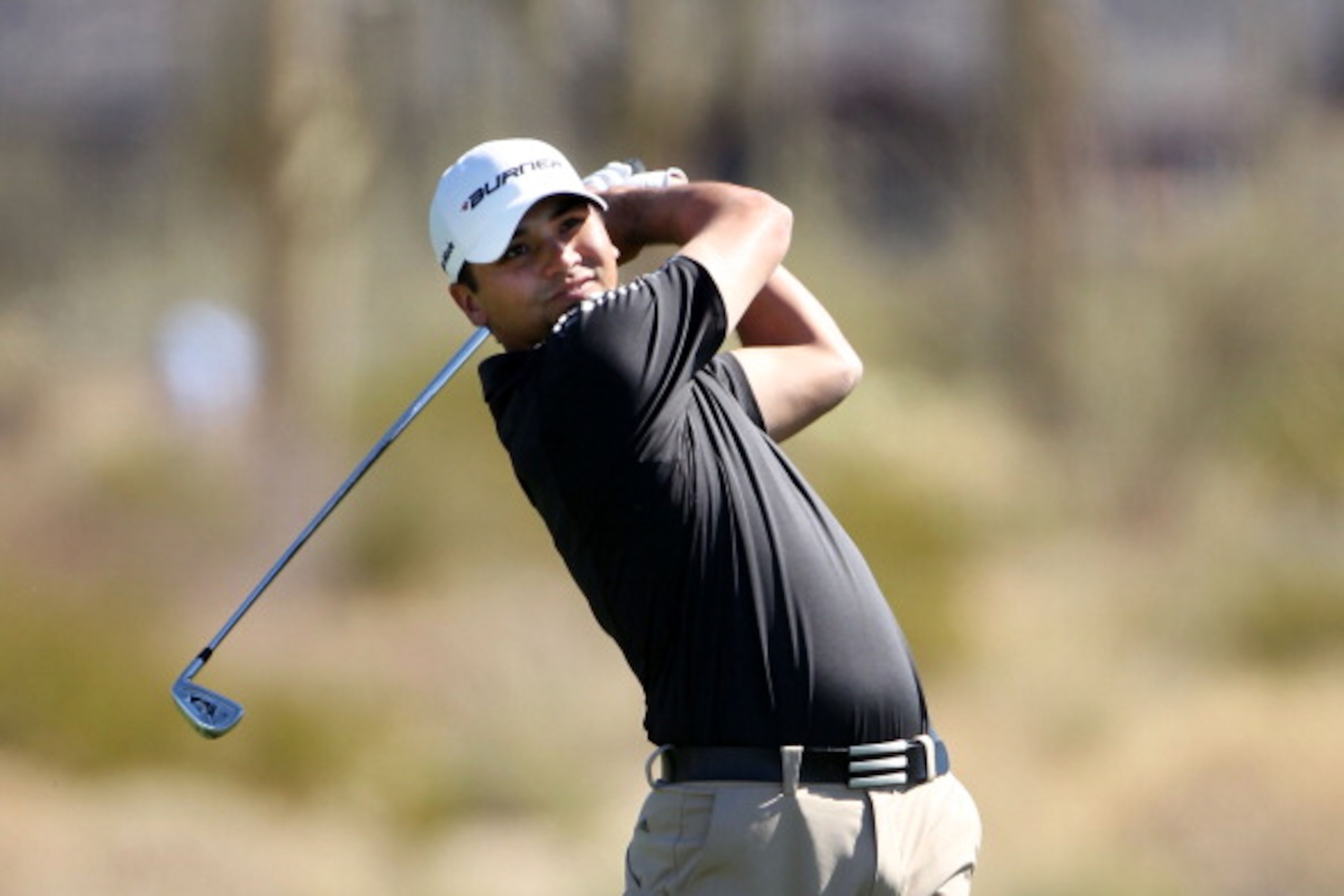 MARANA, AZ - FEBRUARY 25:  Jason Day of Australia hits an approach shot on the second hole during the third round of the Accenture Match Play Championship at the Ritz-Carlton Golf Club on February 25, 2011 in Marana, Arizona.  (Photo by Andy Lyons/Getty I