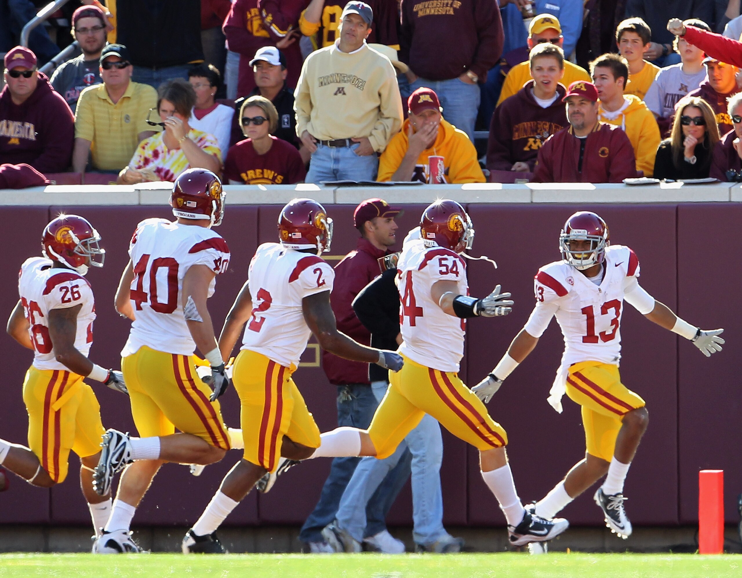 MINNEAPOLIS - SEPTEMBER 18:  Robert Woods #13 of the USC Trojans celebrates with teammates after scoring a touchdown during the game against the Minnesota Golden Gophers on September 18, 2010 at TCF Bank Stadium in Minneapolis, Minnesota.  (Photo by Jamie