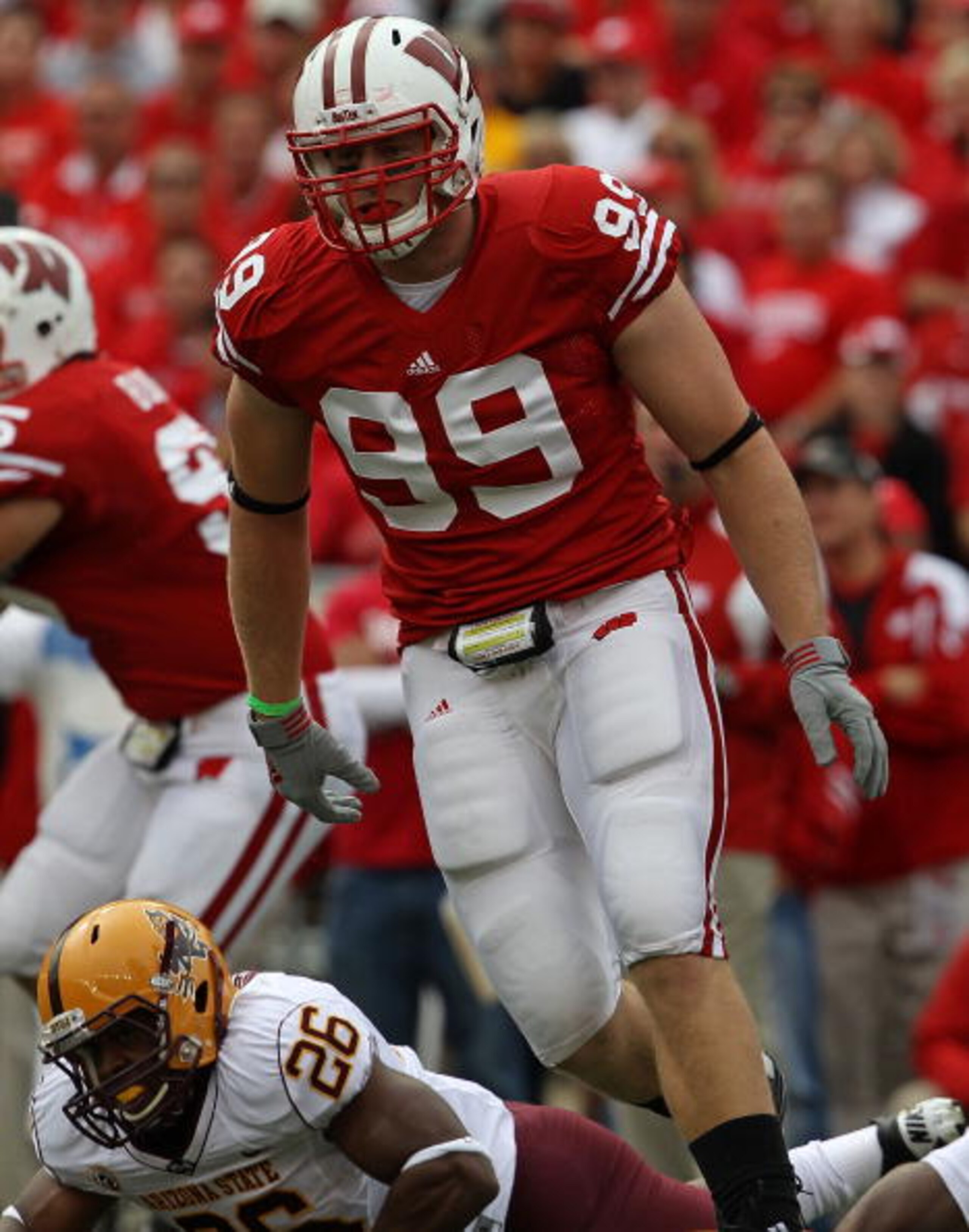 MADISON, WI - SEPTEMBER 18: J.J. Watt #99 of the Wisconsin Badgers rushes against the Arizona State Sun Devils at Camp Randall Stadium on September 18, 2010 in Madison, Wisconsin. Wisconsin defeated Arizona State 20-19. (Photo by Jonathan Daniel/Getty Ima MADISON, WI - SEPTEMBER 18: J.J. Watt #99 of the Wisconsin Badgers rushes against the Arizona State Sun Devils at Camp Randall Stadium on September 18, 2010 in Madison, Wisconsin. Wisconsin defeated Arizona State 20-19. (Photo by Jonathan Daniel/Getty Ima