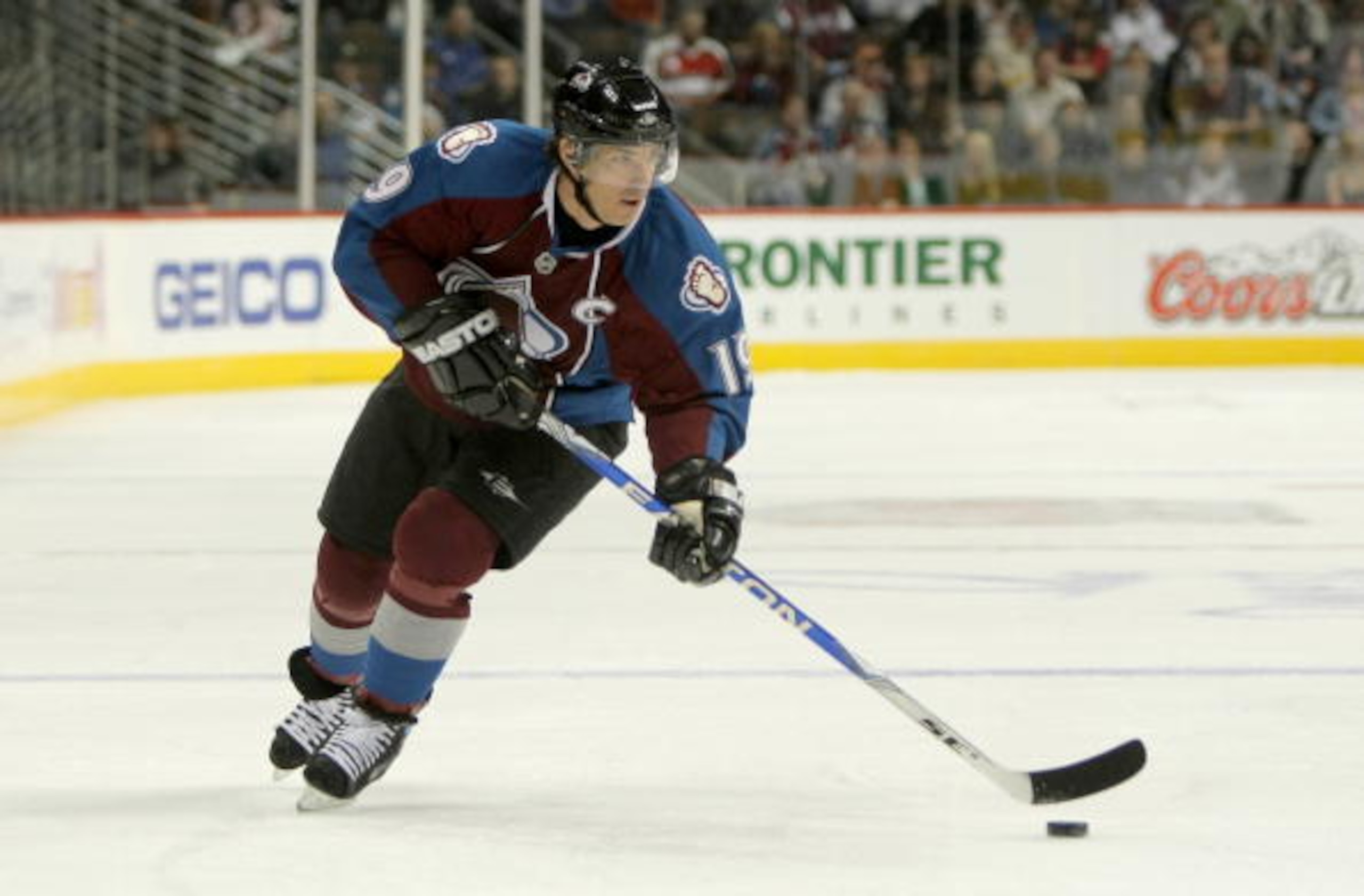 DENVER - OCTOBER 16:  Joe Sakic #19 of the Colorado Avalanche skates with the puck during the NHL game against the Philadelphia Flyers at the Pepsi Center on October 16, 2008 in Denver, Colorado.  (Photo by Doug Pensinger/Getty Images)