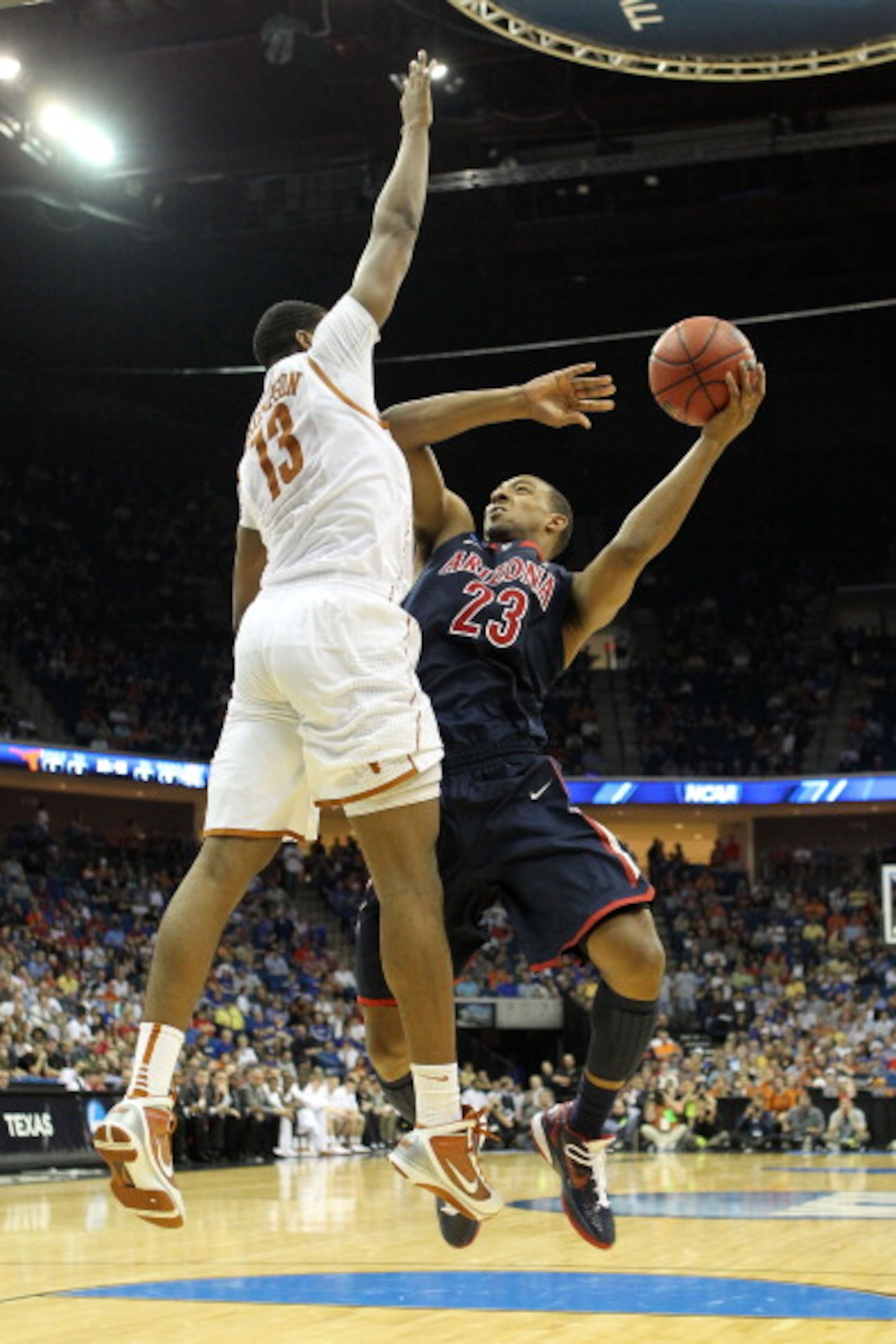 TULSA, OK - MARCH 20:  Derrick Williams #23 of the Arizona Wildcats goes up for a shot against Tristan Thompson #13 of the Texas Longhorns during the third round of the 2011 NCAA men's basketball tournament at BOK Center on March 20, 2011 in Tulsa, Oklaho