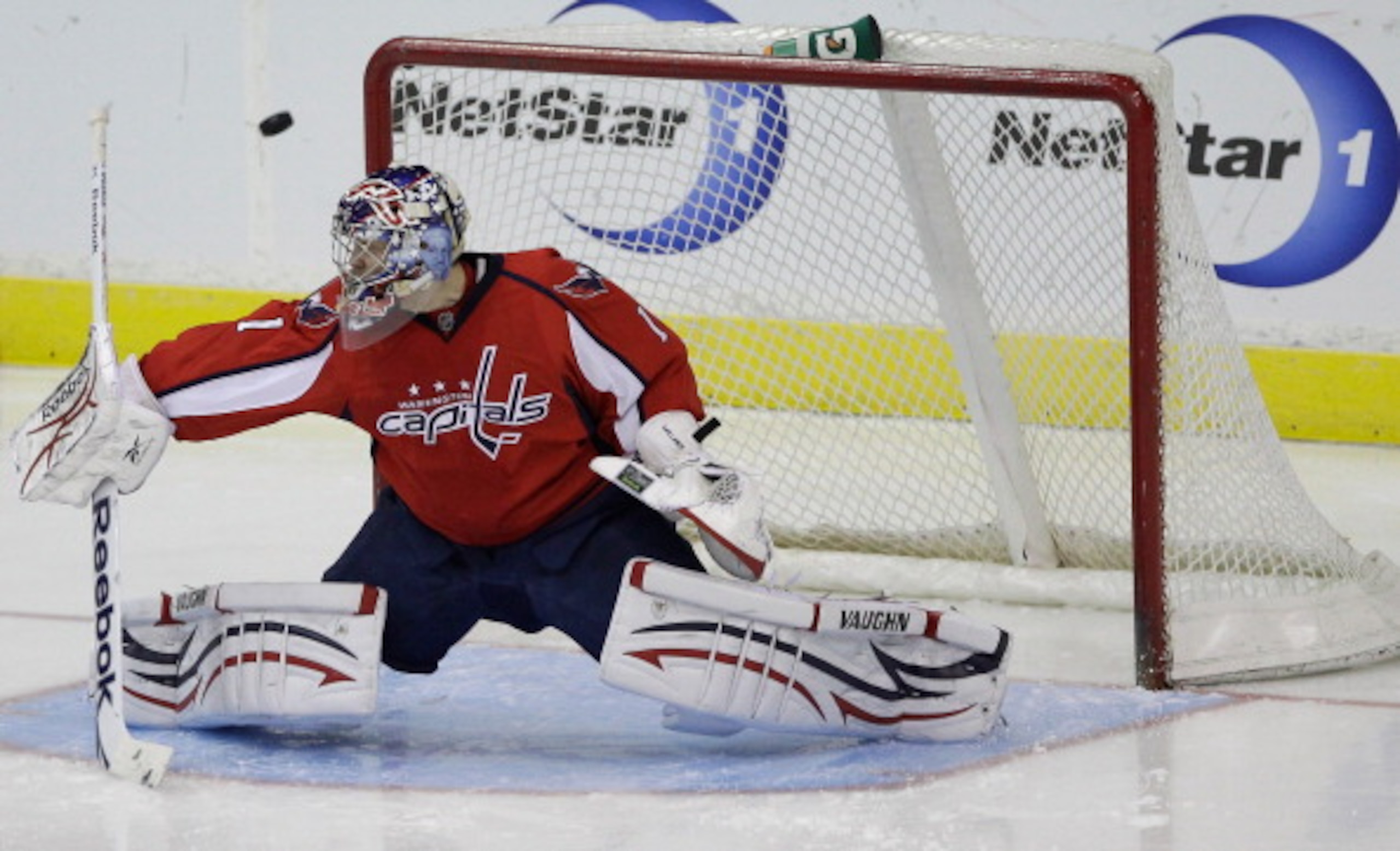 WASHINGTON, DC - MARCH 29:  Semyon Varlamov #1 of the Washington Capitals deflects a shot during the third period against the Carolina Hurricanes at the Verizon Center on March 29, 2011 in Washington, DC.  (Photo by Rob Carr/Getty Images)