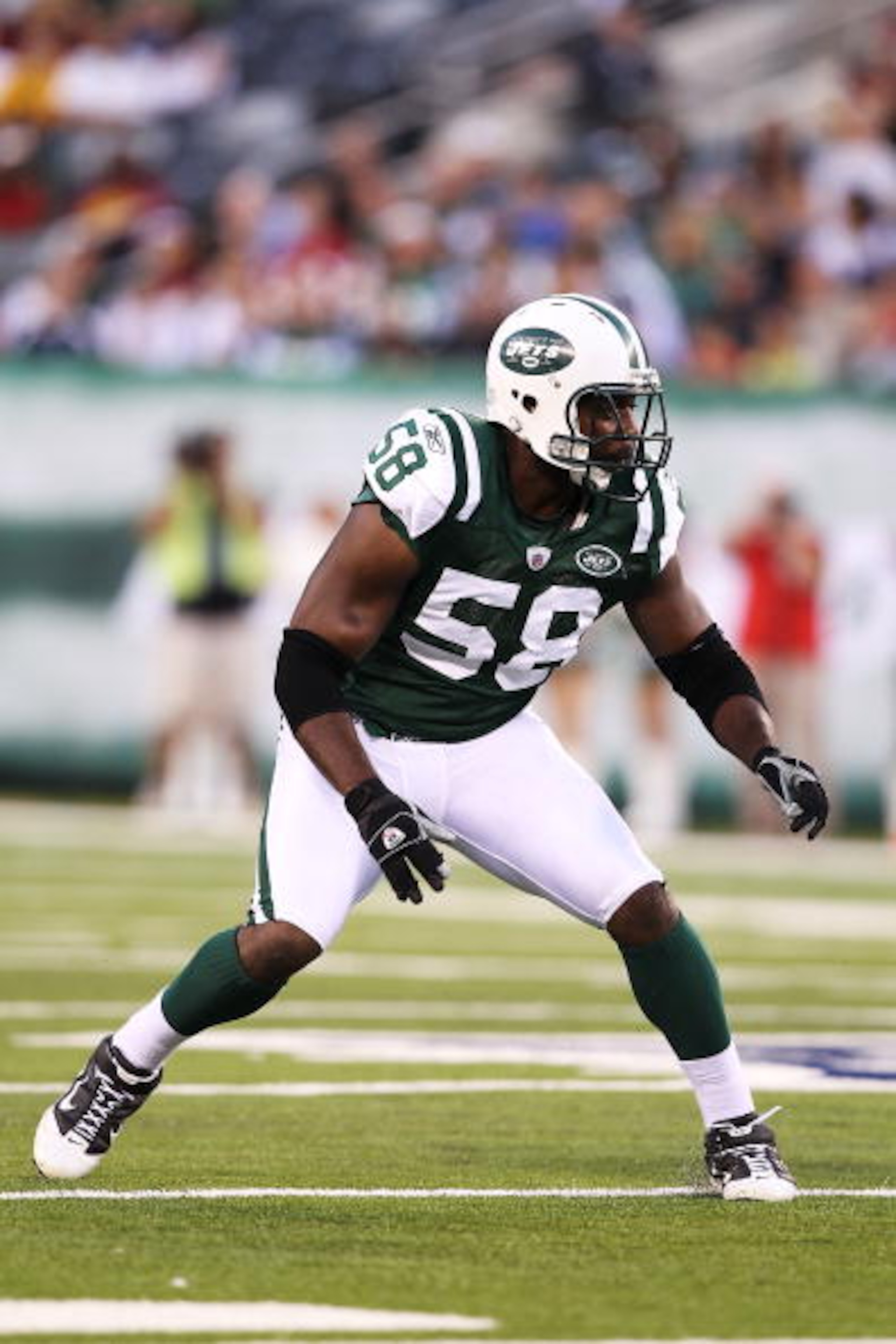 EAST RUTHERFORD, NJ - AUGUST 27:  Bryan Thomas #58 of the New York Jets in action against the Washington Redskins  during their preseason game on August 27, 2010 at the New Meadowlands Stadium  in East Rutherford, New Jersey.  (Photo by Al Bello/Getty Ima
