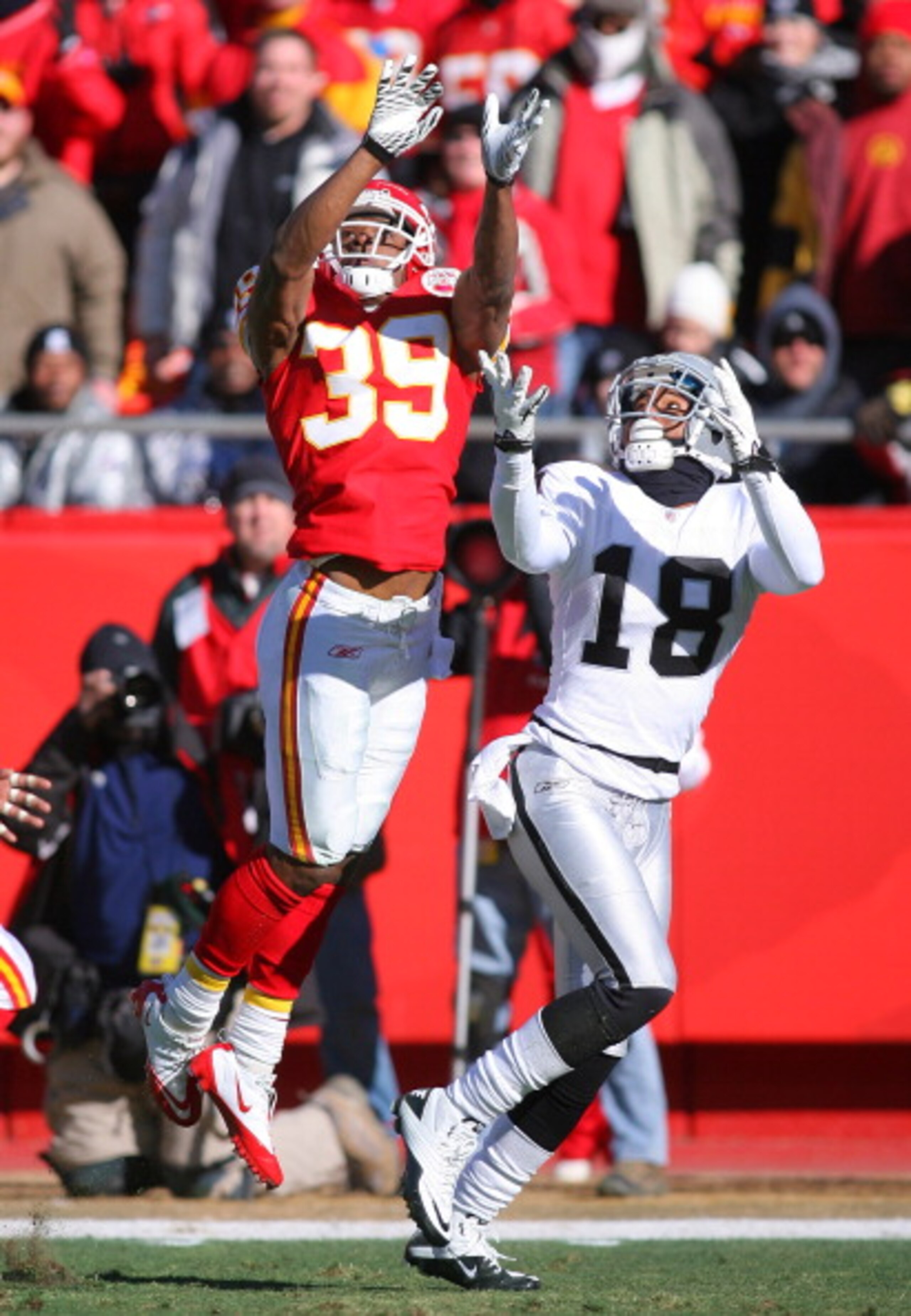 KANSAS CITY, MO - JANUARY 02:  Cornerback Brandon Carr #39 of the Kansas City Chiefs tries to break up a pass intended for wide receiver Louis Murphy #18 of the Oakland Raiders in a game at Arrowhead Stadium on January 2, 2011 in Kansas City, Missouri.  (