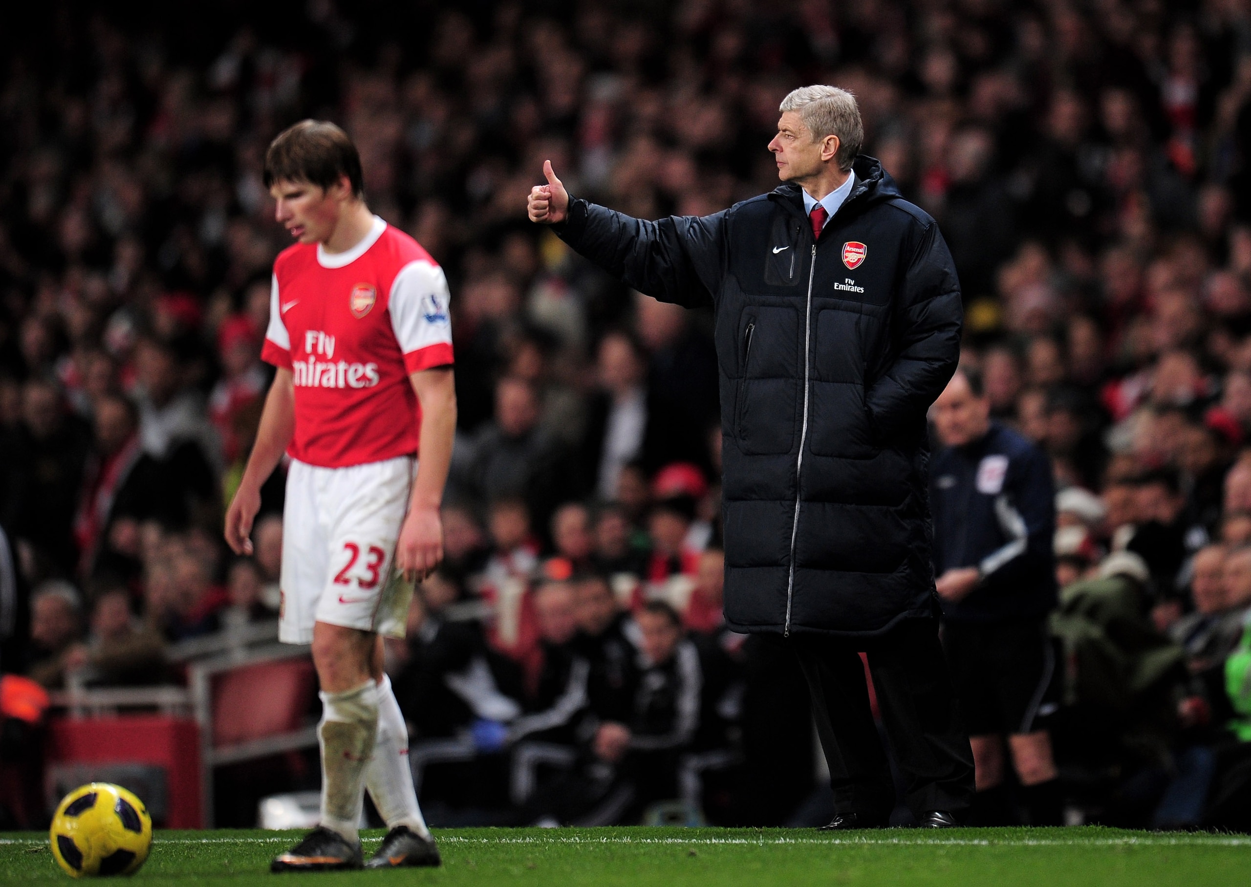 LONDON, ENGLAND - FEBRUARY 23: Arsene Wenger manager of Arsenal gives a thumbs up as Andrey Arshavin (L) of Arsenal waits to take a free kick during the Barclays Premier League match between Arsenal and Stoke City at the Emirates Stadium on February 23, LONDON, ENGLAND - FEBRUARY 23: Arsene Wenger manager of Arsenal gives a thumbs up as Andrey Arshavin (L) of Arsenal waits to take a free kick during the Barclays Premier League match between Arsenal and Stoke City at the Emirates Stadium on February 23,