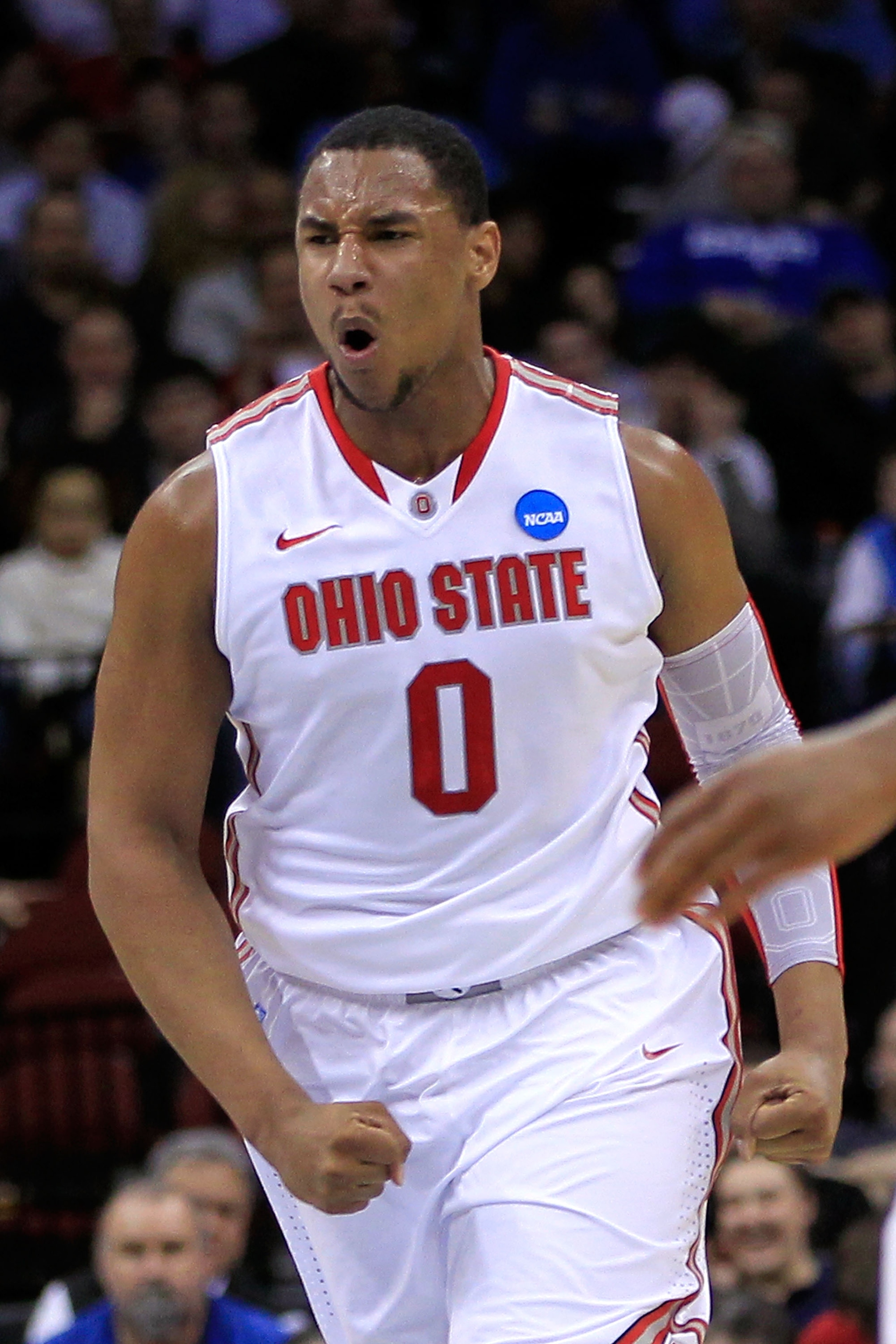 NEWARK, NJ - MARCH 25:  Jared Sullinger #0 of the Ohio State Buckeyes celebrates after a play against the Kentucky Wildcats during the first half of the east regional semifinal of the 2011 NCAA Men's Basketball Tournament at the Prudential Center on March