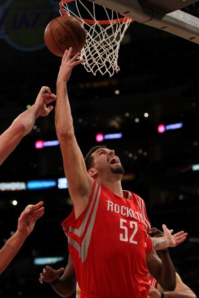 LOS ANGELES, CA - OCTOBER 26:  Brad Miller #52 of the Houston Rockets takes a shot against the Los Angeles Lakers during their game at Staples Center on October 26, 2010 in Los Angeles, California. NOTE TO USER: User expressly acknowledges and agrees that