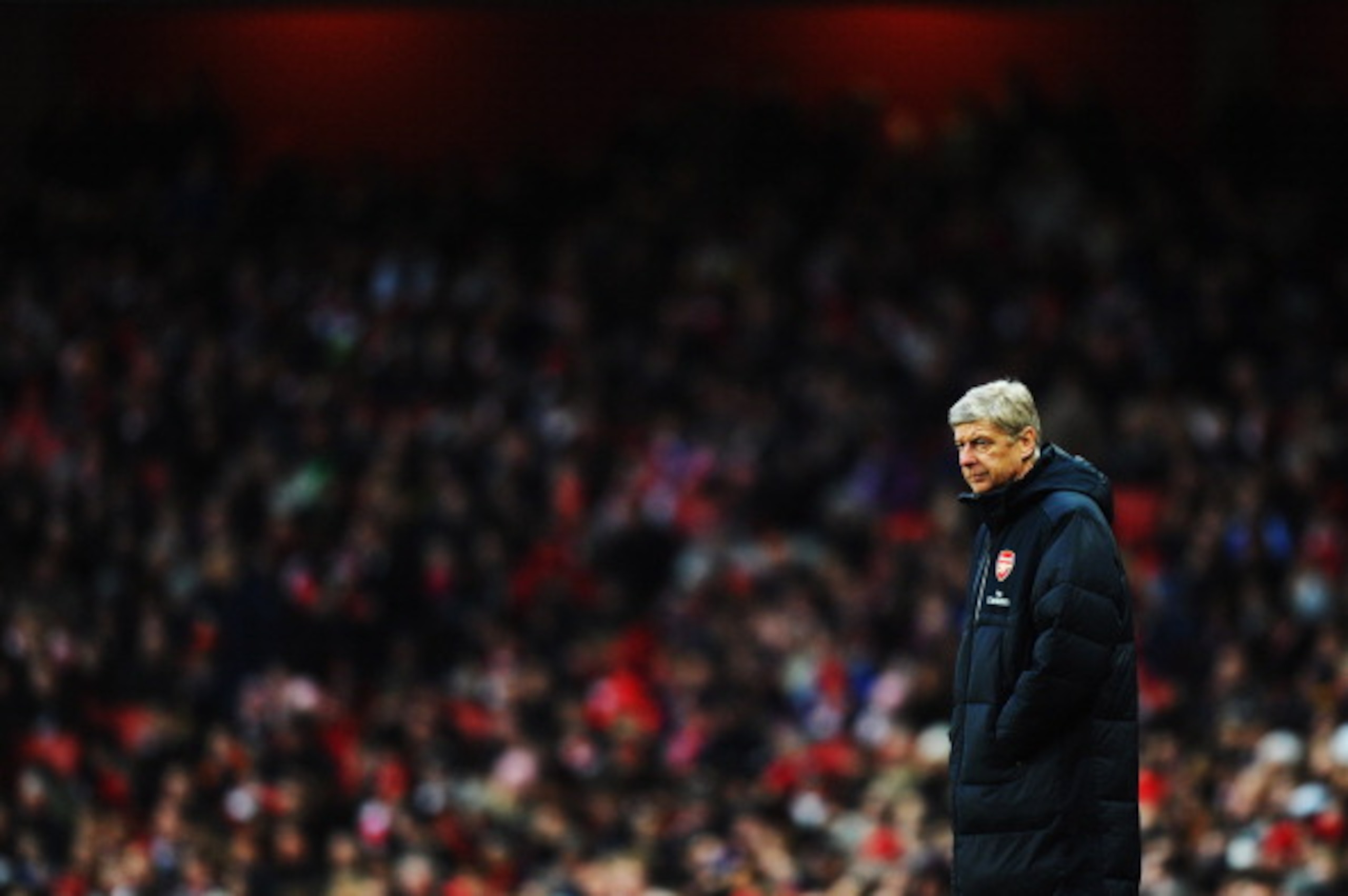 LONDON, UNITED KINGDOM - JANUARY 22: Arsene Wenger the Arsenal manager watches from the touchline during the Barclays Premier League match between Arsenal and Wigan Athletic at the Emirates Stadium on January 22, 2011 in London, England. (Photo by Mike LONDON, UNITED KINGDOM - JANUARY 22: Arsene Wenger the Arsenal manager watches from the touchline during the Barclays Premier League match between Arsenal and Wigan Athletic at the Emirates Stadium on January 22, 2011 in London, England. (Photo by Mike