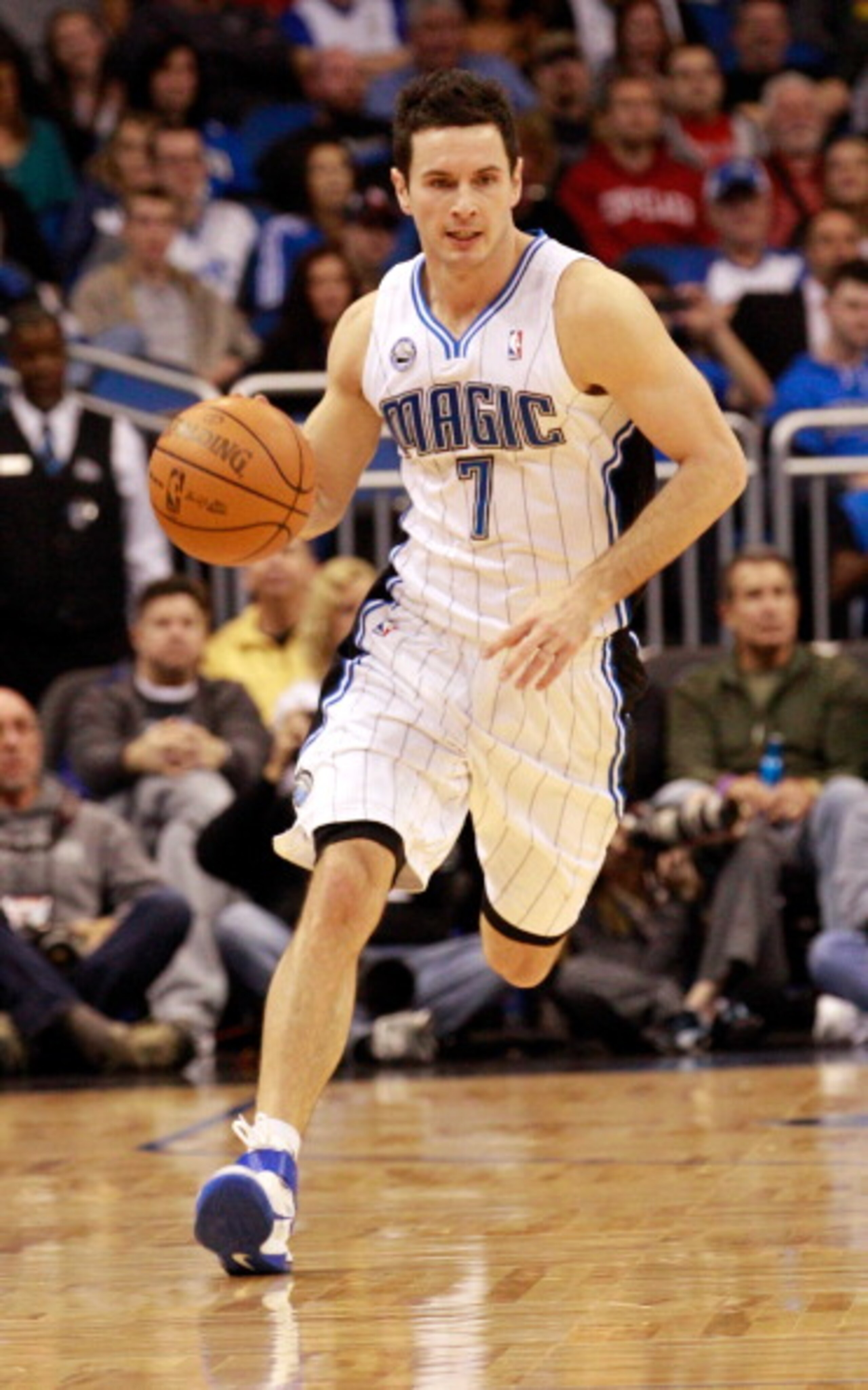 ORLANDO, FL - FEBRUARY 08:  J.J. Redick #7 of the Orlando Magic drives up the court during the game against the Los Angeles Clippers at Amway Arena on February 8, 2011 in Orlando, Florida.  NOTE TO USER: User expressly acknowledges and agrees that, by dow