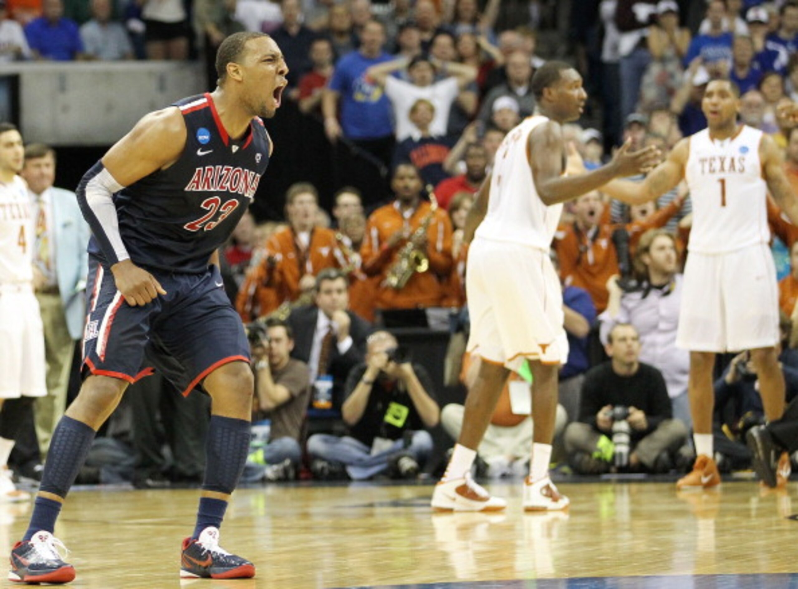 TULSA, OK - MARCH 20:  Derrick Williams #23 of the Arizona Wildcats celebrates after defeating the Texas Longhorns 70-69 in the third round of the 2011 NCAA men's basketball tournament at BOK Center on March 20, 2011 in Tulsa, Oklahoma.  (Photo by Ronald