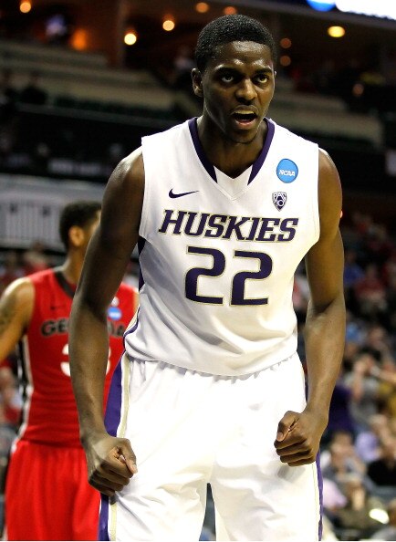 CHARLOTTE, NC - MARCH 18:  Justin Holiday #22 of the Washington Huskies reacts in the second half while taking on the Georgia Bulldogs during the second round of the 2011 NCAA men's basketball tournament at Time Warner Cable Arena on March 18, 2011 in Cha