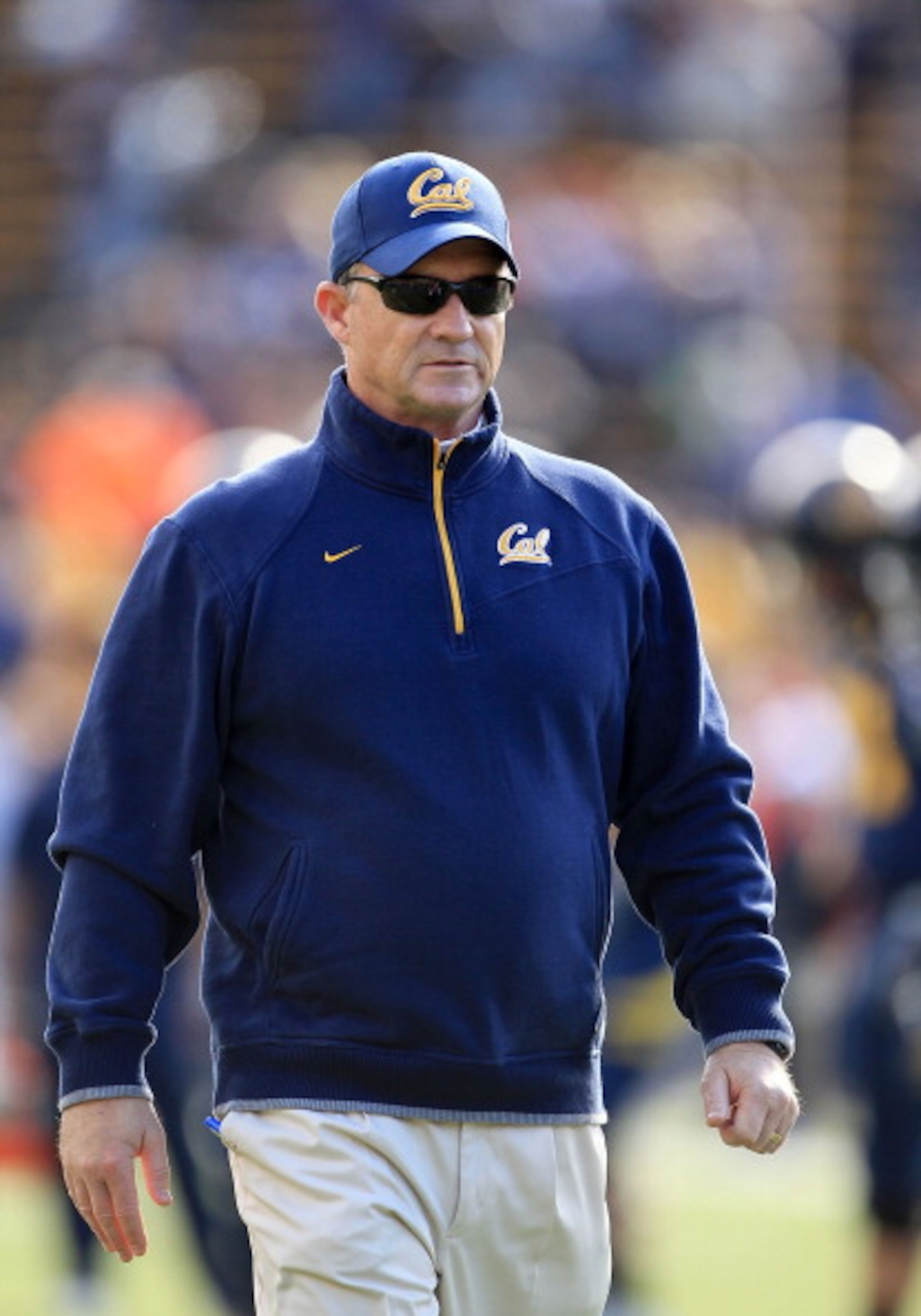 BERKELEY, CA - NOVEMBER 20:  Head coach Jeff Tedford of the California Golden Bears watches his team warm up before their game against the Stanford Cardinal at California Memorial Stadium on November 20, 2010 in Berkeley, California.  (Photo by Ezra Shaw/