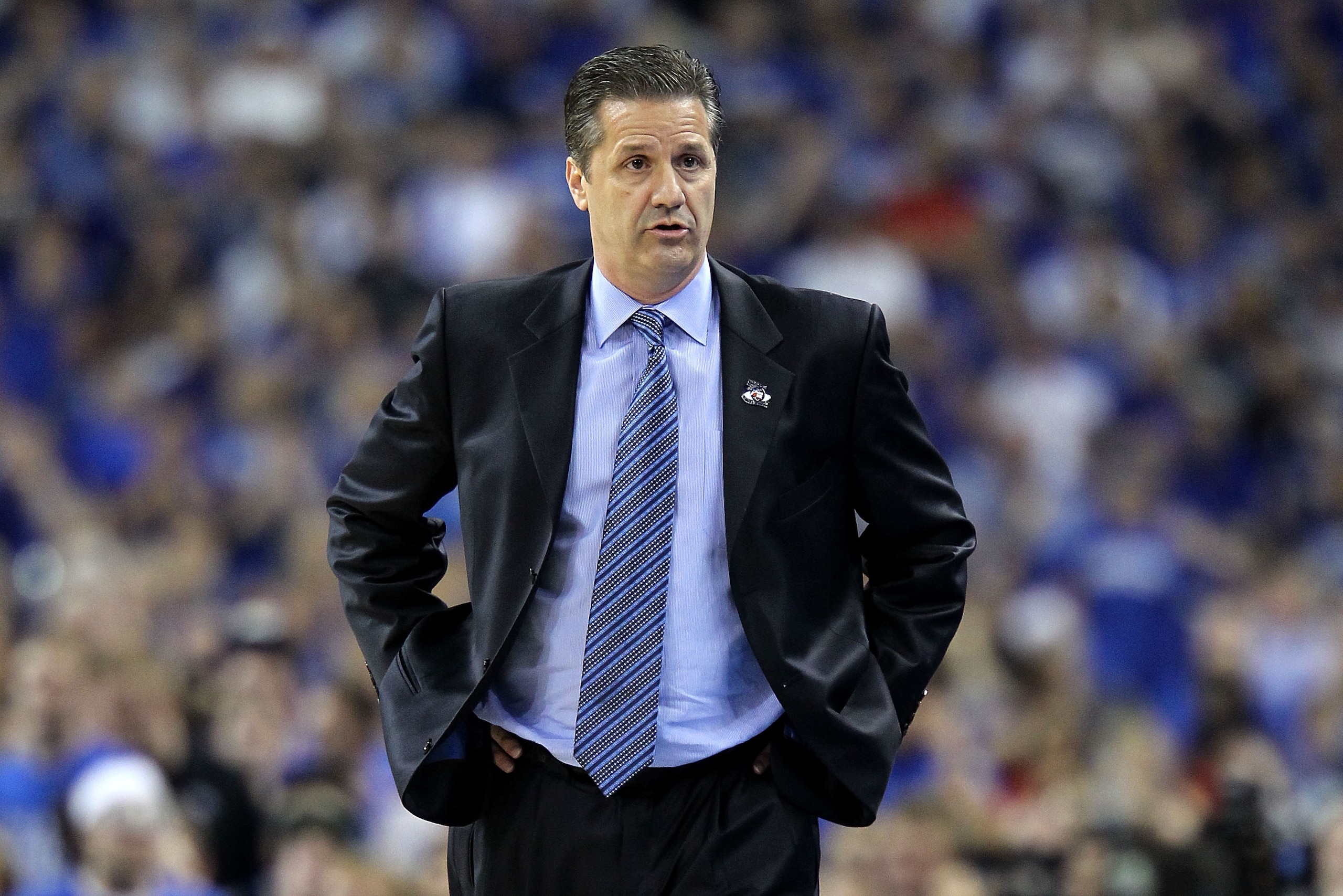 HOUSTON, TX - APRIL 02: Head coach John Calipari of the Kentucky Wildcats reacts from the sidelines against the Connecticut Huskies during the National Semifinal game of the 2011 NCAA Division I Men's Basketball Championship at Reliant Stadium on April 2 HOUSTON, TX - APRIL 02: Head coach John Calipari of the Kentucky Wildcats reacts from the sidelines against the Connecticut Huskies during the National Semifinal game of the 2011 NCAA Division I Men's Basketball Championship at Reliant Stadium on April 2