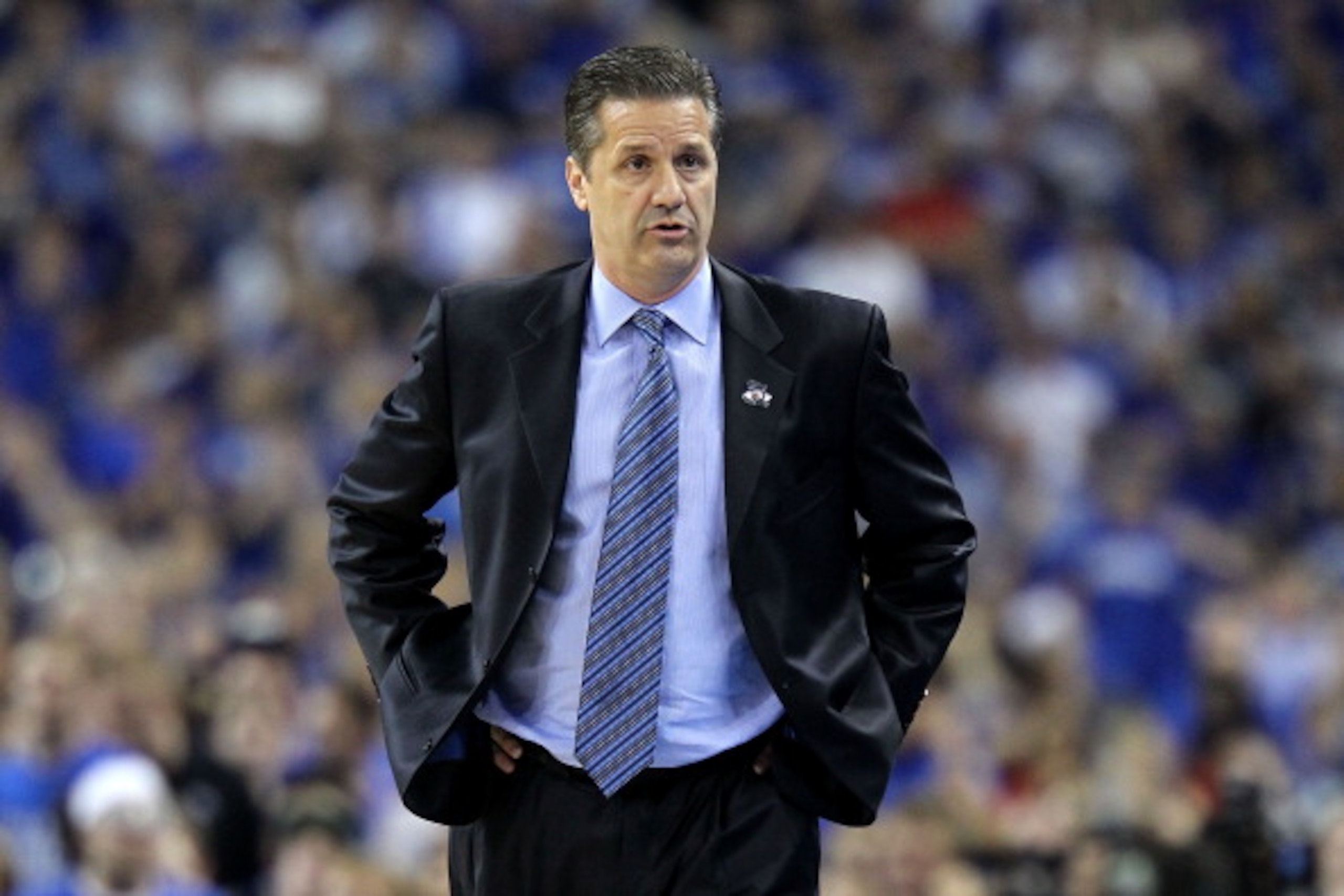 HOUSTON, TX - APRIL 02:  Head coach John Calipari of the Kentucky Wildcats reacts from the sidelines against the Connecticut Huskies during the National Semifinal game of the 2011 NCAA Division I Men's Basketball Championship at Reliant Stadium on April 2
