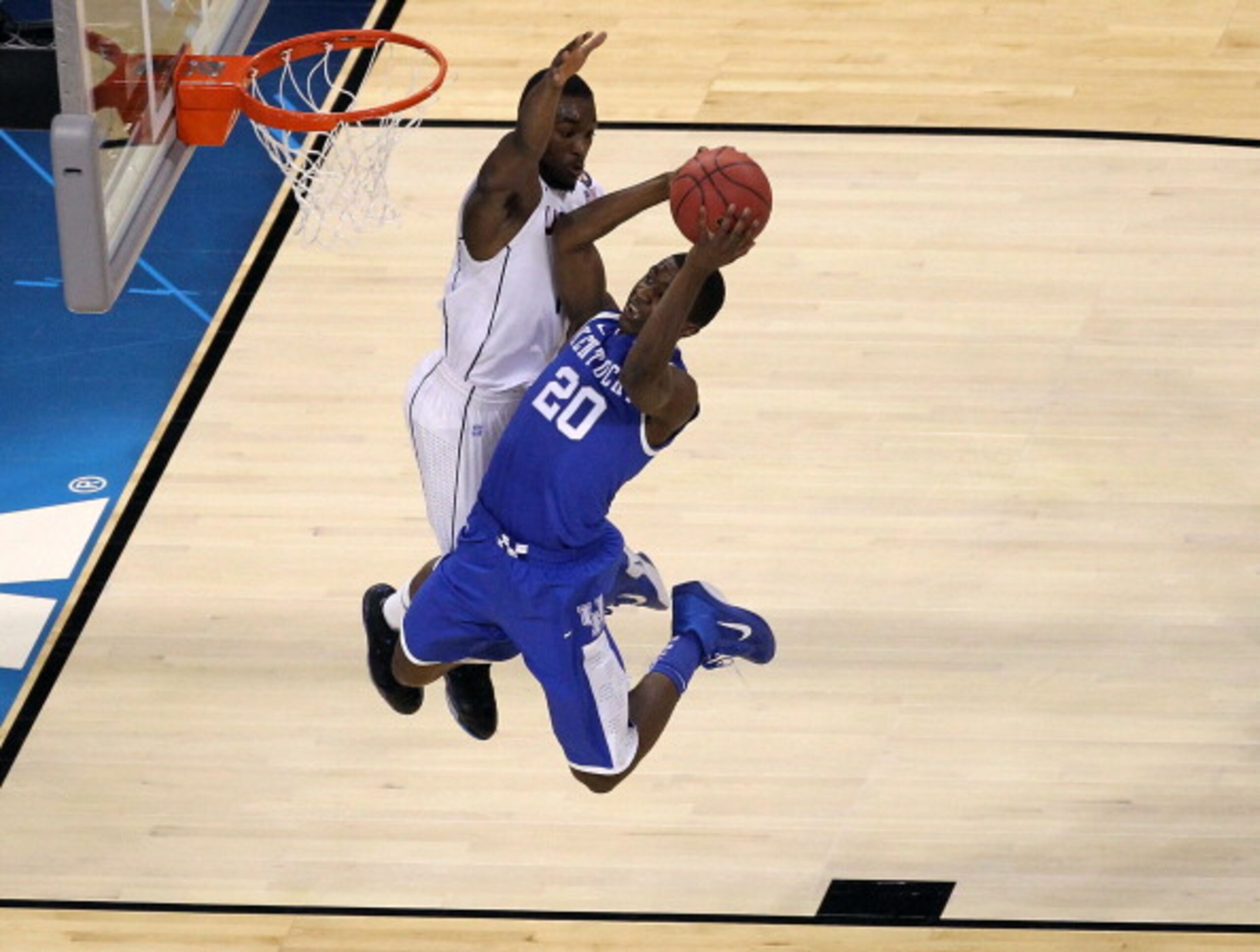 HOUSTON, TX - APRIL 02: Doron Lamb #20 of the Kentucky Wildcats goes to the hoop against Kemba Walker #15 of the Connecticut Huskies during the National Semifinal game of the 2011 NCAA Division I Men's Basketball Championship at Reliant Stadium on April HOUSTON, TX - APRIL 02: Doron Lamb #20 of the Kentucky Wildcats goes to the hoop against Kemba Walker #15 of the Connecticut Huskies during the National Semifinal game of the 2011 NCAA Division I Men's Basketball Championship at Reliant Stadium on April