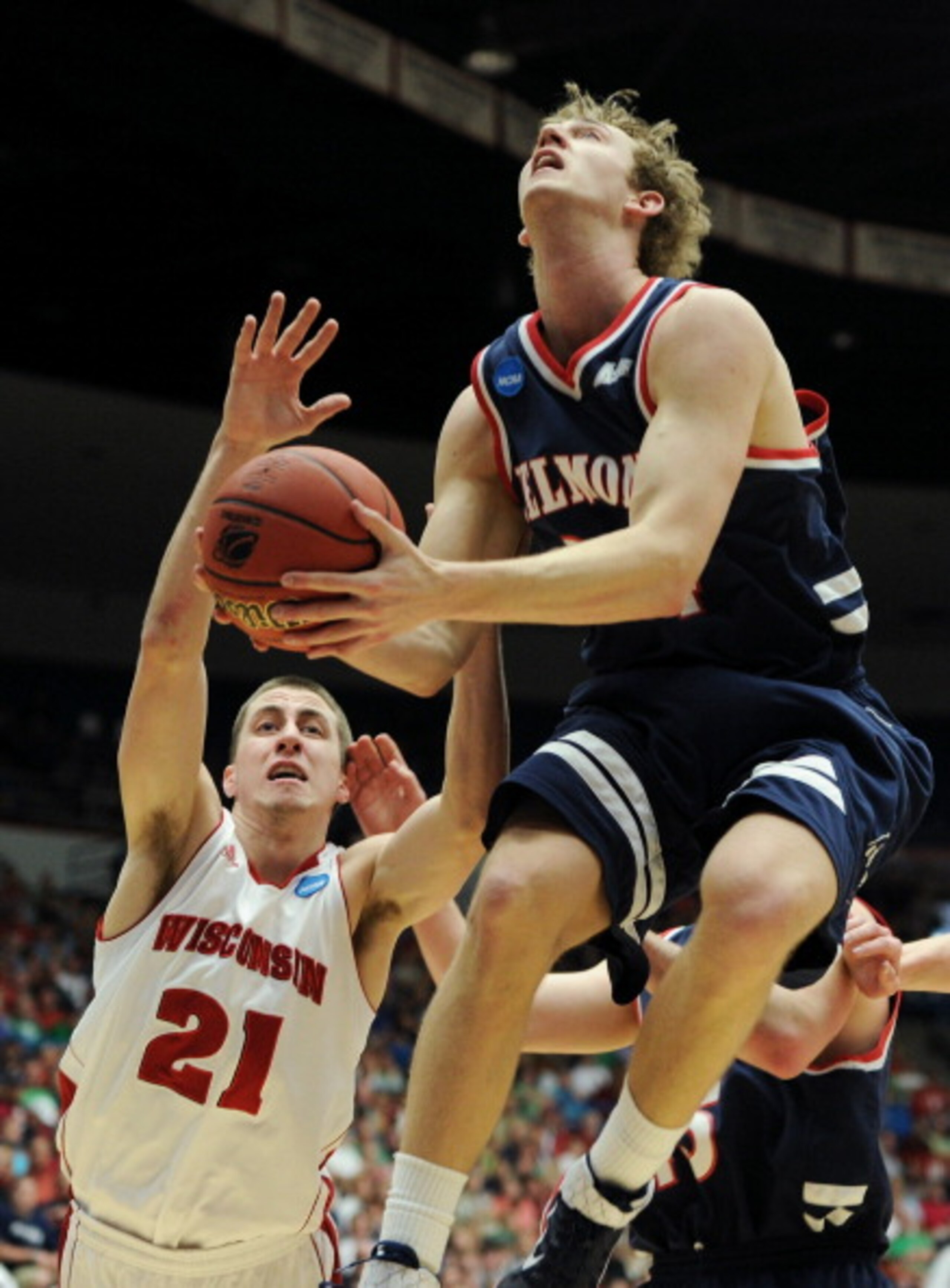 TUCSON, AZ - MARCH 17:  Mick Hedgepeth #34 of the Belmont Bruins goes up against Josh Gasser #21 of the Wisconsin Badgers during the second round of the 2011 NCAA men's basketball tournament at McKale Center on March 17, 2011 in Tucson, Arizona.  (Photo b