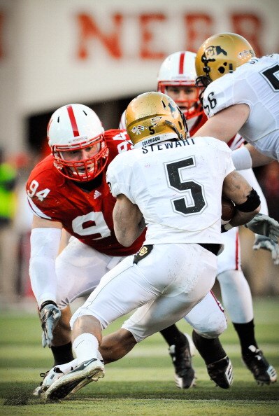 LINCOLN, NE - NOVEMBER 26: Jared Crick #94 of the Nebraska Cornhuskers zero in on for Rodney Stewart #5 of the Colorado Buffaloes during their game at Memorial Stadium on November 26, 2010 in Lincoln, Nebraska. Nebraska defeated Colorado 45-17 (Photo by E