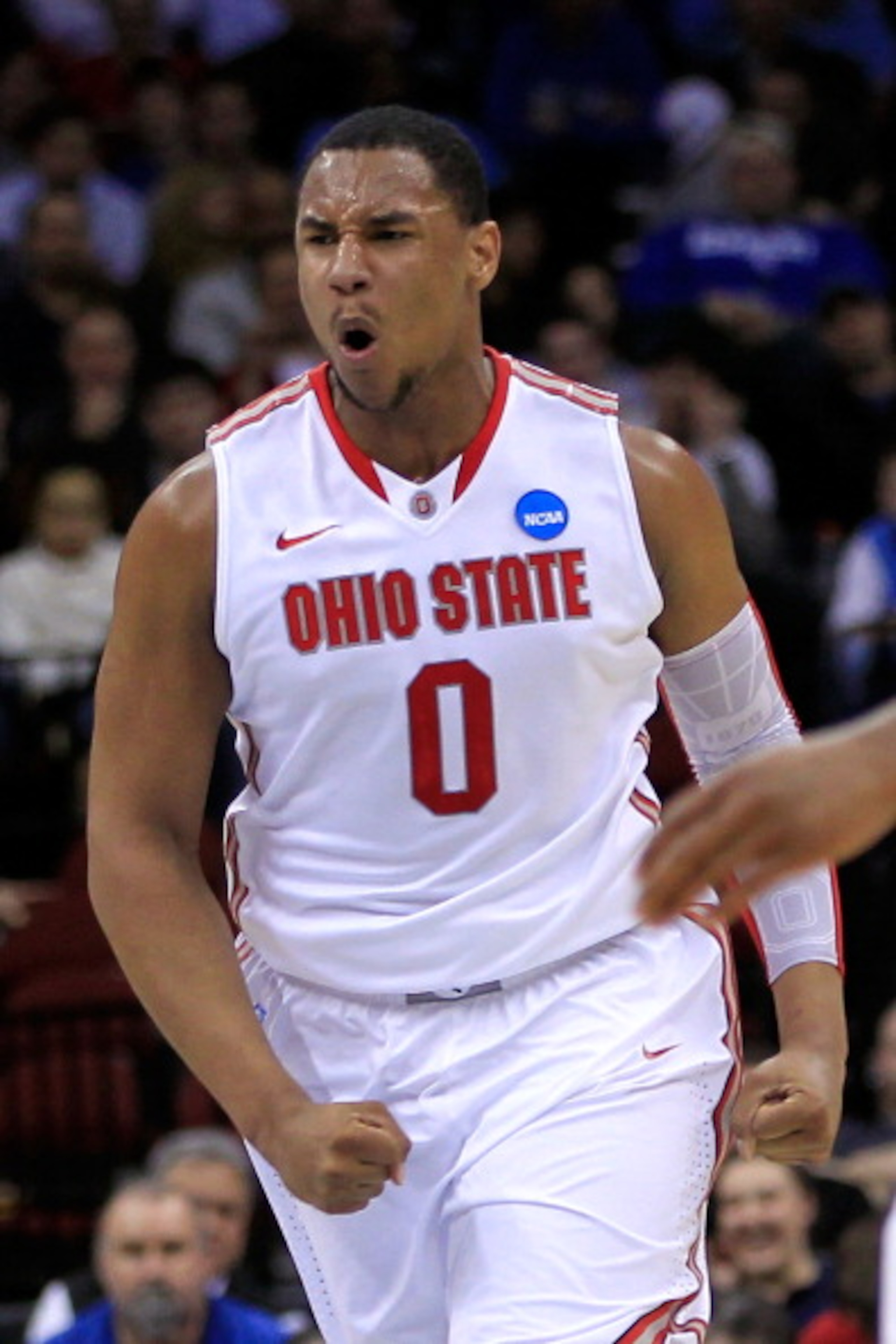 NEWARK, NJ - MARCH 25:  Jared Sullinger #0 of the Ohio State Buckeyes celebrates after a play against the Kentucky Wildcats during the first half of the east regional semifinal of the 2011 NCAA Men's Basketball Tournament at the Prudential Center on March