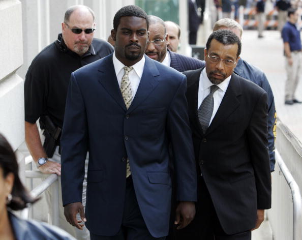 RICHMOND, VA - AUGUST 27:  Atlanta Falcons quarterback Michael Vick (R) arrives at federal court with attorney Billy Martin (R) August 27, 2007 in Richmond, Viriginia. Vick pleaded guilty to a federal dogfighting charge.  (Photo by Steve Helber-Pool/Getty