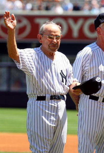 NEW YORK - JULY 19:  New York Yankees Hall of Famer Yogi Berra waves to the crowd during the teams 63rd Old Timers Day before the game against the Detroit Tigers on July 19, 2009 at Yankee Stadium in the Bronx borough of New York City.  (Photo by Jim McIs