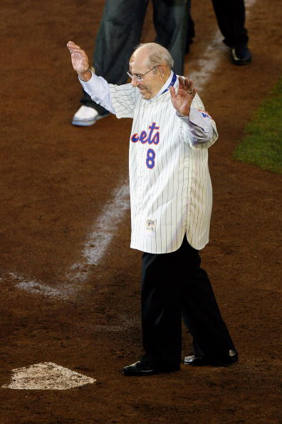 NEW YORK - SEPTEMBER 28:  Former Mets manager Yogi Berra greets fans from the field in a post game ceremony after the last regular season baseball game ever played in Shea Stadium against the Florida Marlins on September 28, 2008 in the Flushing neighborh