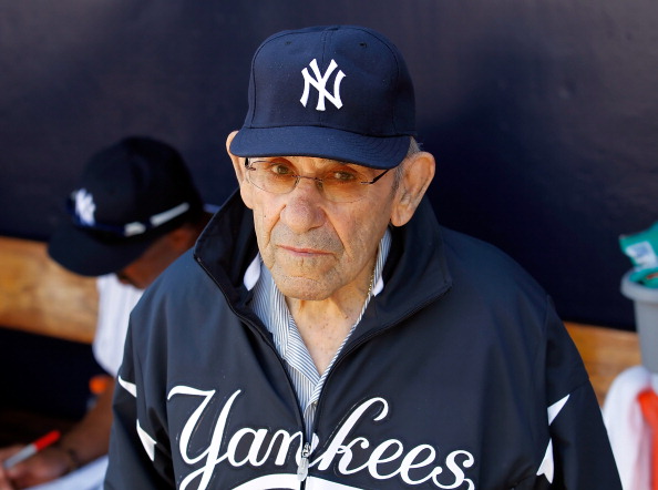 TAMPA, FL - FEBRUARY 26:  Hall of Famer Yogi Berra of the New York Yankees stands in the dugout just prior to the start of the Grapefruit League Spring Training Game against the Philadelphia Phillies at George M. Steinbrenner Field on February 26, 2011 in