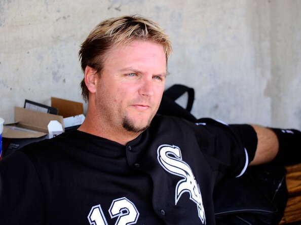 PHOENIX, AZ - MARCH 17:  A.J. Pierzynski #12 of the Chicago White Sox sits in the dug out against the Milwaukee Brewers during the spring training game at Maryvale Baseball Park on March 17, 2011 in Phoenix, Arizona.  (Photo by Kevork Djansezian/Getty Ima