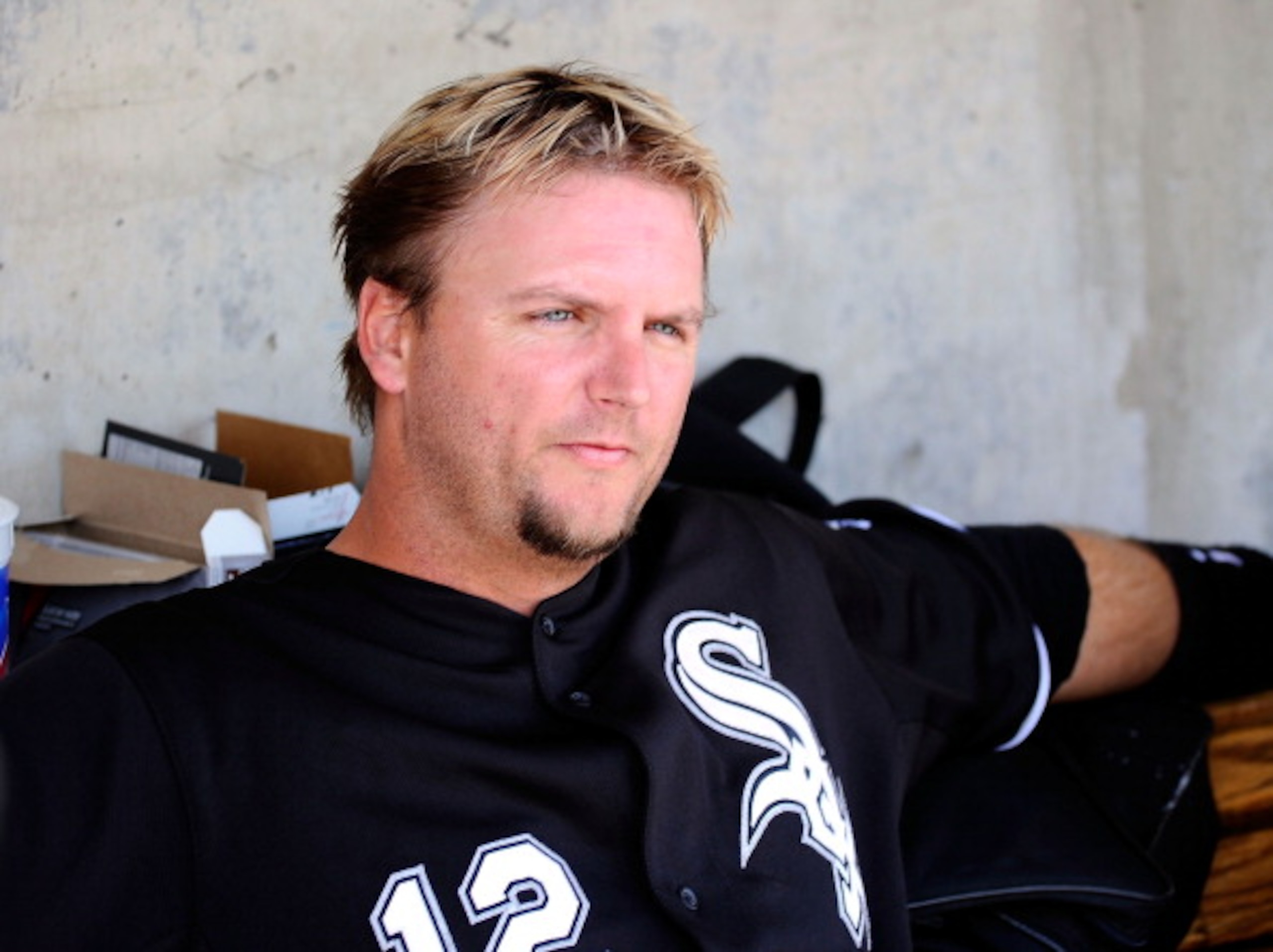 PHOENIX, AZ - MARCH 17:  A.J. Pierzynski #12 of the Chicago White Sox sits in the dug out against the Milwaukee Brewers during the spring training game at Maryvale Baseball Park on March 17, 2011 in Phoenix, Arizona.  (Photo by Kevork Djansezian/Getty Ima