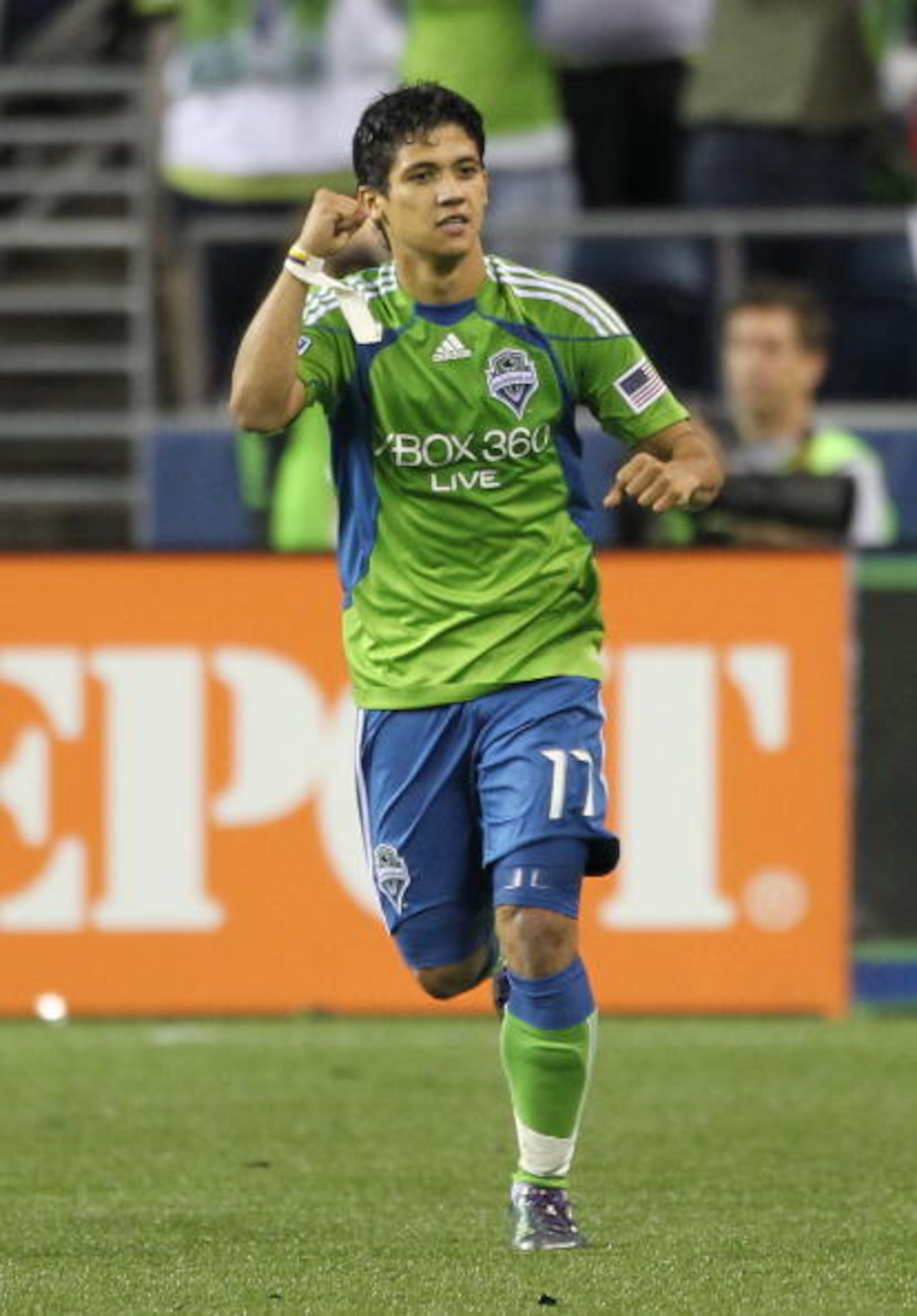 SEATTLE - AUGUST 08:  Fredy Montero #17 of the Seattle Sounders FC celebrates after scoring a goal against the Houston Dynamo on August 8, 2010 at Qwest Field in Seattle, Washington. The Sounders defeated the Dynamo 2-0. (Photo by Otto Greule Jr/Getty Ima