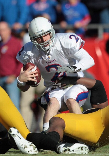 KANSAS CITY, MO - NOVEMBER 27:  Quarterback Jordan Webb #2 of the Kansas Jayhawks is sacked by Aldon Smith #85 of the Missouri Tigers during the game on November 27, 2010 at Arrowhead Stadium in Kansas City, Missouri.  (Photo by Jamie Squire/Getty Images)