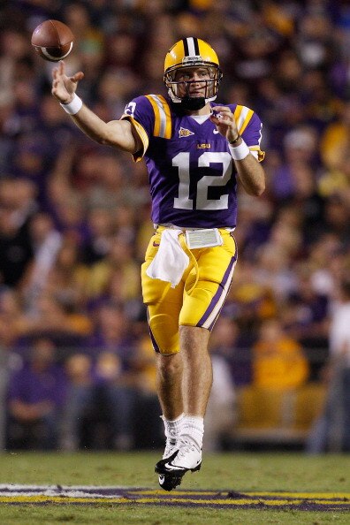 BATON ROUGE, LA - NOVEMBER 13:  Quarterback Jarrett Lee #12 of the Louisiana State University Tigers throws a pass against the University of Louisiana-Monroe Warhawks at Tiger Stadium on November 13, 2010 in Baton Rouge, Louisiana.  (Photo by Chris Grayth