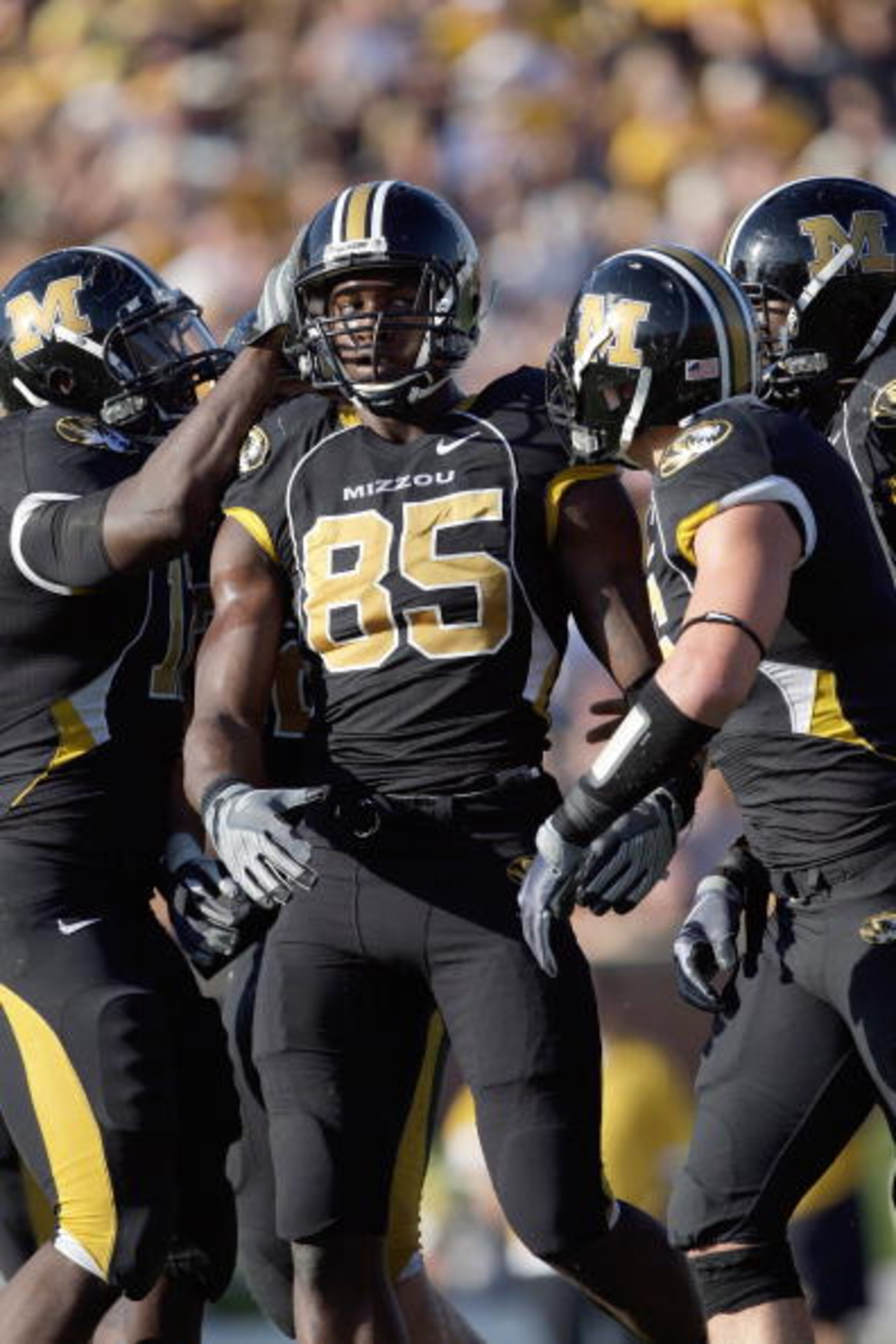 COLUMBIA, MO - NOVEMBER 7: Aldon Smith #85 of the Missouri Tigers is congratulated by teammates during the game against the Baylor Bears at Faurot Field/Memorial Stadium on November 7, 2009 in Columbia, Missouri. (Photo by Jamie Squire/Getty Images) COLUMBIA, MO - NOVEMBER 7: Aldon Smith #85 of the Missouri Tigers is congratulated by teammates during the game against the Baylor Bears at Faurot Field/Memorial Stadium on November 7, 2009 in Columbia, Missouri. (Photo by Jamie Squire/Getty Images)