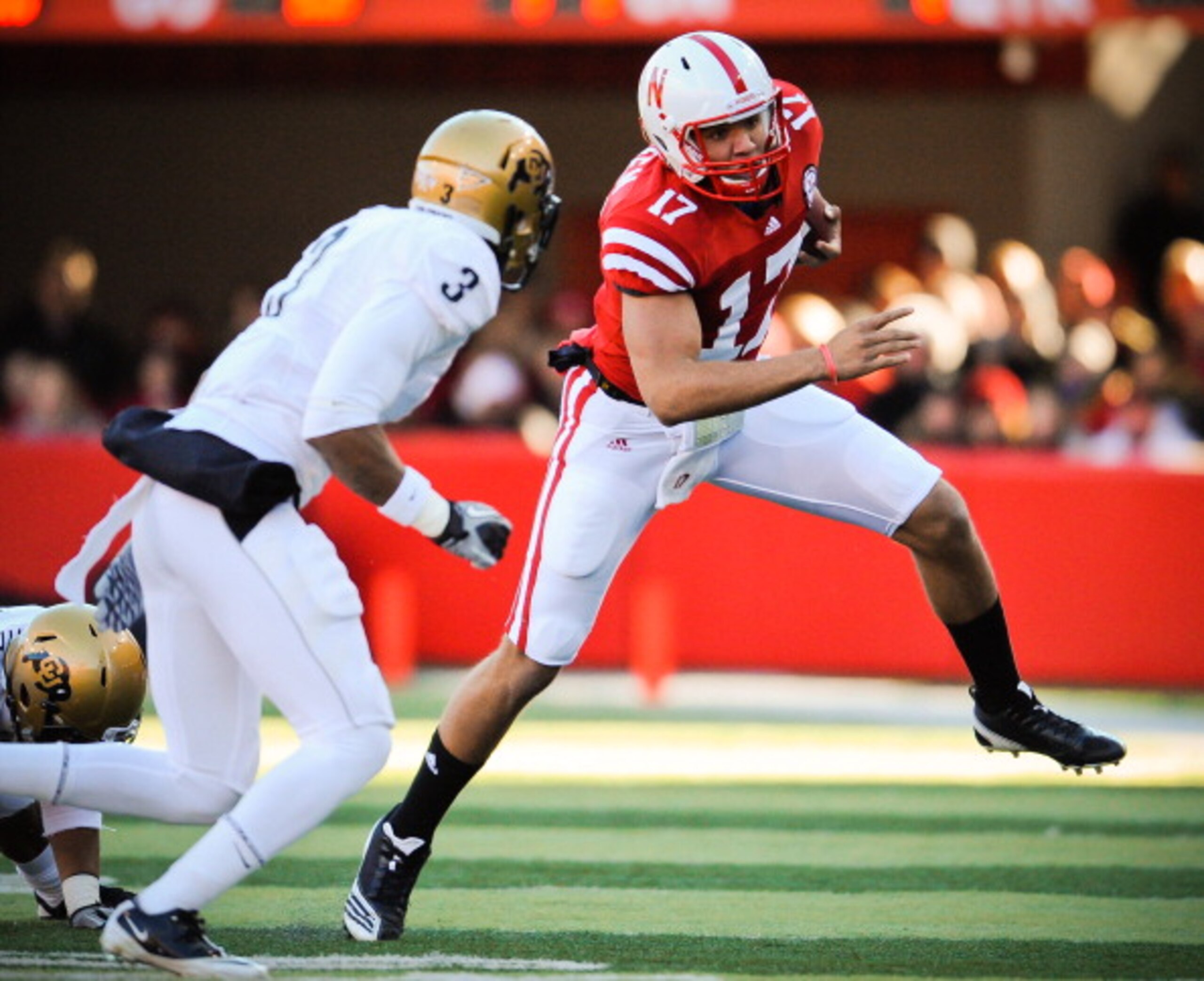 LINCOLN, NE - NOVEMBER 26: Cody Green #17 of the Nebraska Cornhuskers slips past Jimmy Smith #3 of the Colorado Buffaloes during their game at Memorial Stadium on November 26, 2010 in Lincoln, Nebraska. Nebraska defeated Colorado 45-17 (Photo by Eric Fran LINCOLN, NE - NOVEMBER 26: Cody Green #17 of the Nebraska Cornhuskers slips past Jimmy Smith #3 of the Colorado Buffaloes during their game at Memorial Stadium on November 26, 2010 in Lincoln, Nebraska. Nebraska defeated Colorado 45-17 (Photo by Eric Fran