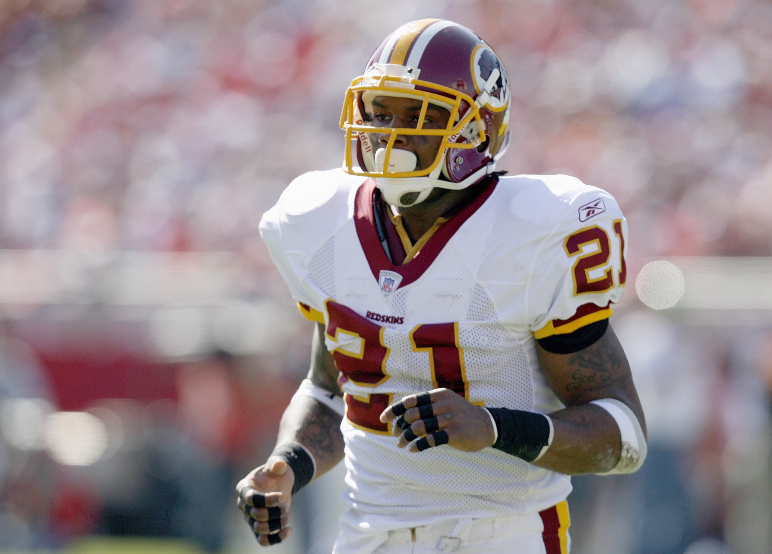 TAMPA - NOVEMBER 19:  Sean Taylor #21 of the Washington Redskins jogs on the field during the game against the Tampa Bay Buccaneers on November 19, 2006 at Raymond James Stadium in Tampa, Florida. (Photo by Matt Stroshane/Getty Images)
