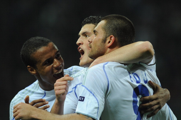 MILAN, ITALY - APRIL 05: Edu (R) of Schalke 04 celebrates with his team mates after scoring a goal during the UEFA Champions League Quarter Final match between FC Internazionale Milano and Schalke 04 at San Siro Stadium on April 5, 2011 in Milan, Italy.