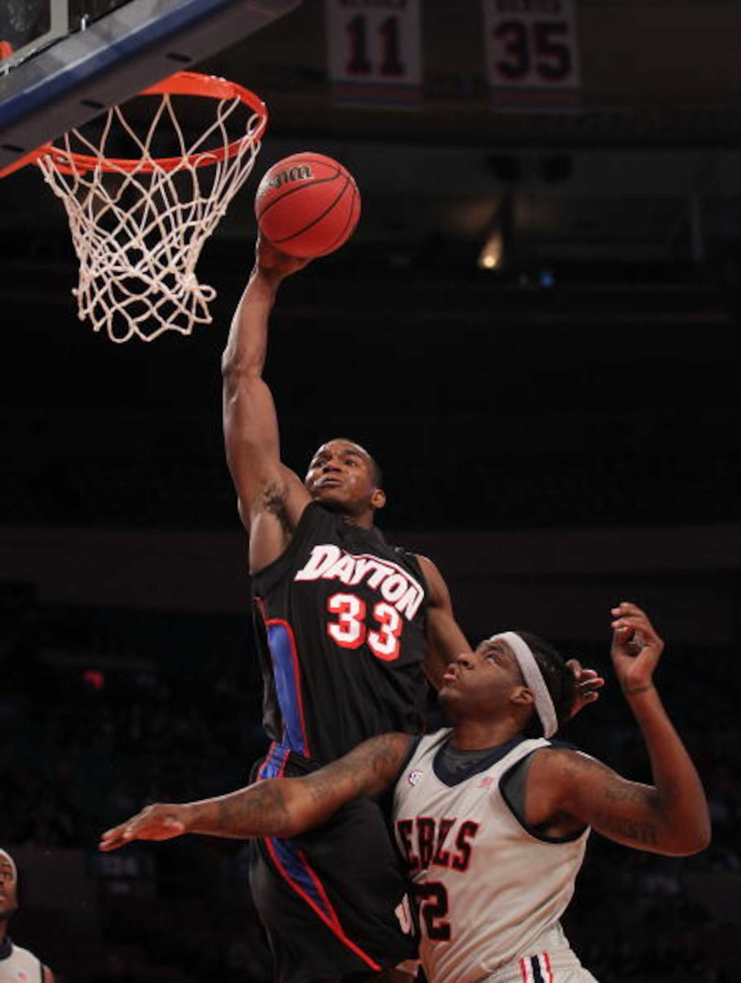 NEW YORK - MARCH 30: Chris Wright #33 of the Dayton Flyers goes over DeAundre Cranston #52 of Ole Miss during their semi final at Madison Square Garden on March 30, 2010 in New York, New York. (Photo by Nick Laham/Getty Images) NEW YORK - MARCH 30: Chris Wright #33 of the Dayton Flyers goes over DeAundre Cranston #52 of Ole Miss during their semi final at Madison Square Garden on March 30, 2010 in New York, New York. (Photo by Nick Laham/Getty Images)