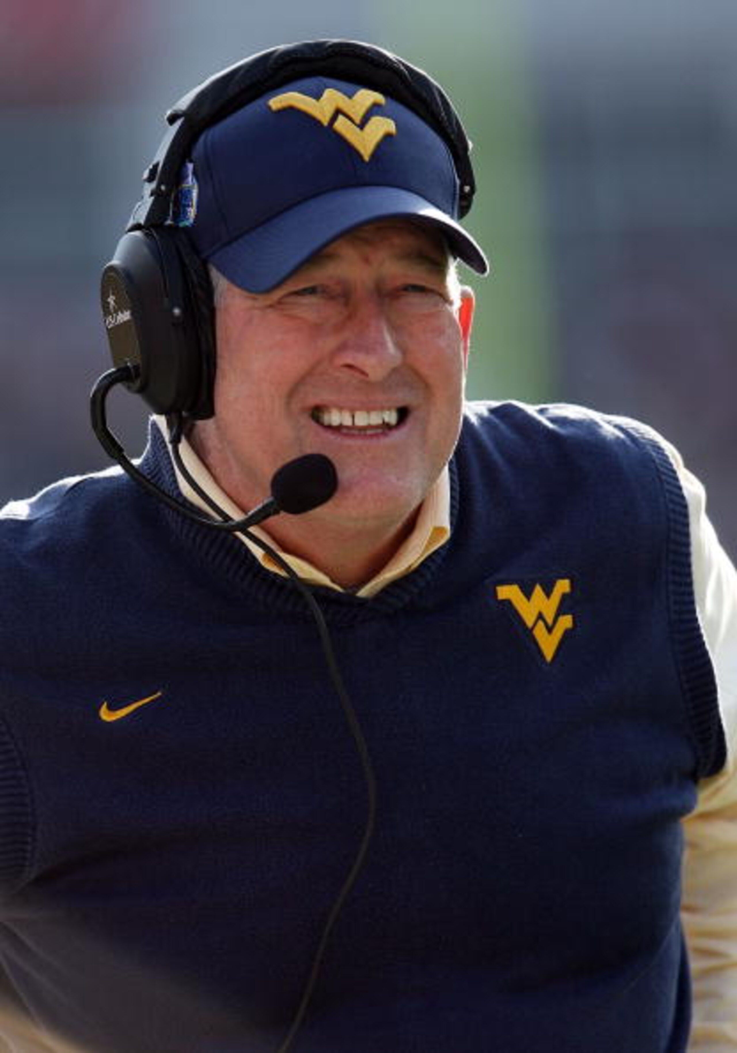 JACKSONVILLE, FL - JANUARY 01:  Head coach Bill Stewart of the West Virginia Mountaineers watches his team take on the Florida State Seminoles during the Konica Minolta Gator Bowl on January 1, 2010 at Jacksonville Municipal Stadium in Jacksonville, Flori
