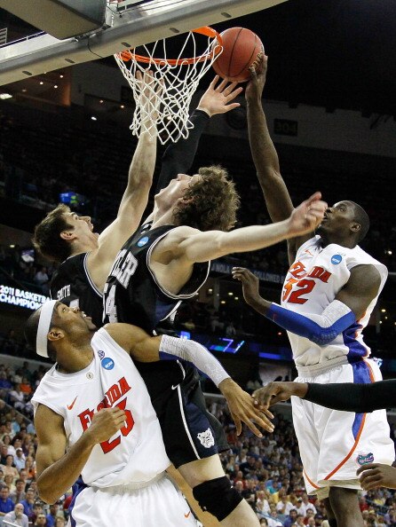 NEW ORLEANS, LA - MARCH 26:  Vernon Macklin #32 of the Florida Gators shoots over Matt Howard #54 and Andrew Smith #44 of the Butler Bulldogs in the second half during the Southeast regional final of the 2011 NCAA men's basketball tournament at New Orlean