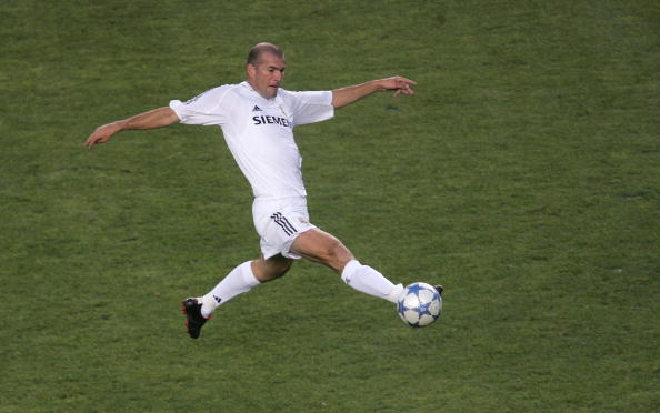 CARSON, CA - JULY 18:  Zinedine Zidane #5 of the Real Madrid dribbles against the defense of the Los Angeles Galaxy during the game at the Home Depot Center on July 18, 2005 in Carson, California.  (Photo by Stephen Dunn/Getty Images)