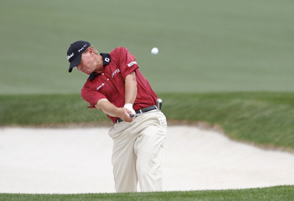 HUMBLE, TX - APRIL 02:  Steve Stricker hits his second shot from a fairway bunker on the 13th hole during the third round of the Shell Houston Open at Redstone Golf Club on April 2, 2011 in Humble, Texas.  (Photo by Michael Cohen/Getty Images)