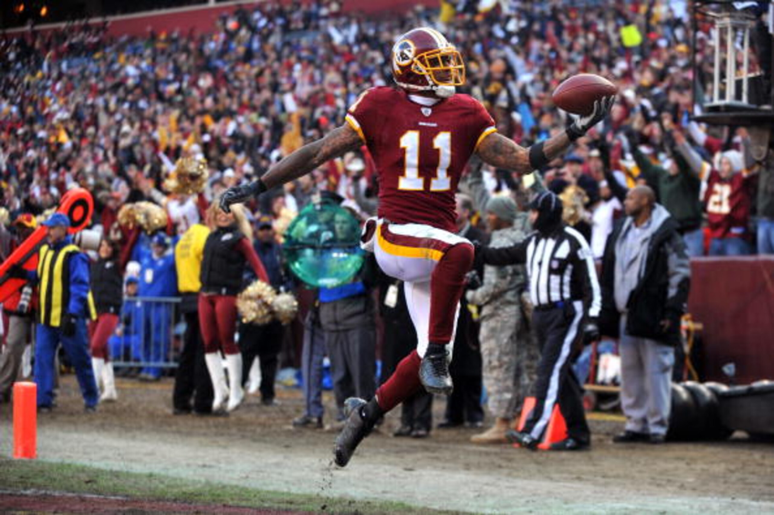 LANDOVER, MD - DECEMBER 6:  Devin Thomas #11 of the Washington Redskins makes a fingertip catch for a touchdown in the first half against the New Orleans Saints at FedExField on December 6, 2009 in Landover, Maryland. The Saints defeated the Redskins in o