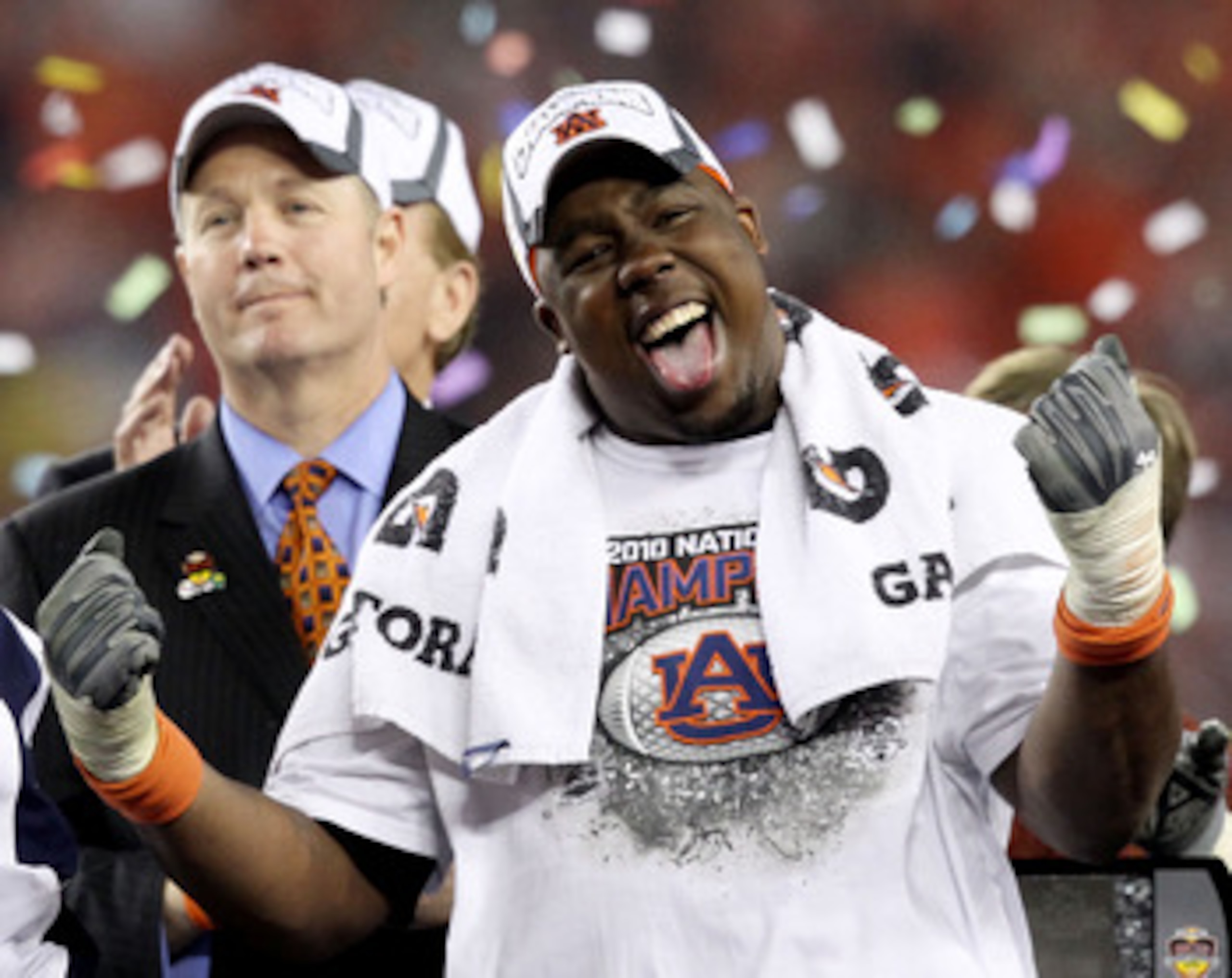 GLENDALE, AZ - JANUARY 10:  Nick Fairley #90 of the Auburn Tigers celebrates the Tigers 22-19 victory against the Oregon Ducks during the Tostitos BCS National Championship Game at University of Phoenix Stadium on January 10, 2011 in Glendale, Arizona.  (