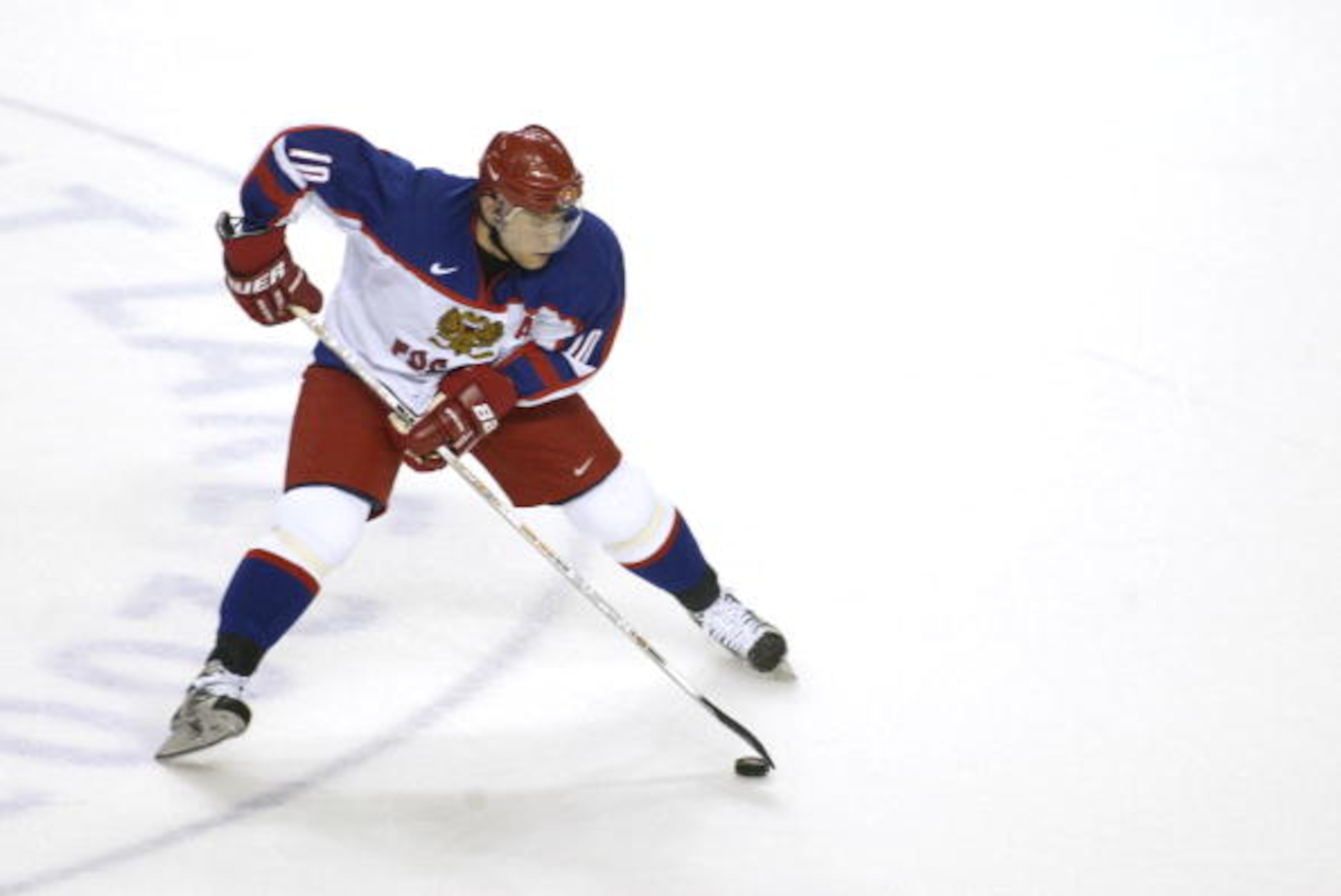 22 Feb 2002:   Pavel Bure #10 of Russia skates through center ice during men's semifinals at the Salt Lake City Winter Olympic Games at the E Center in Salt Lake City, Utah. DIGITAL IMAGE. Mandatory Credit:   Adam Pretty/Getty Images