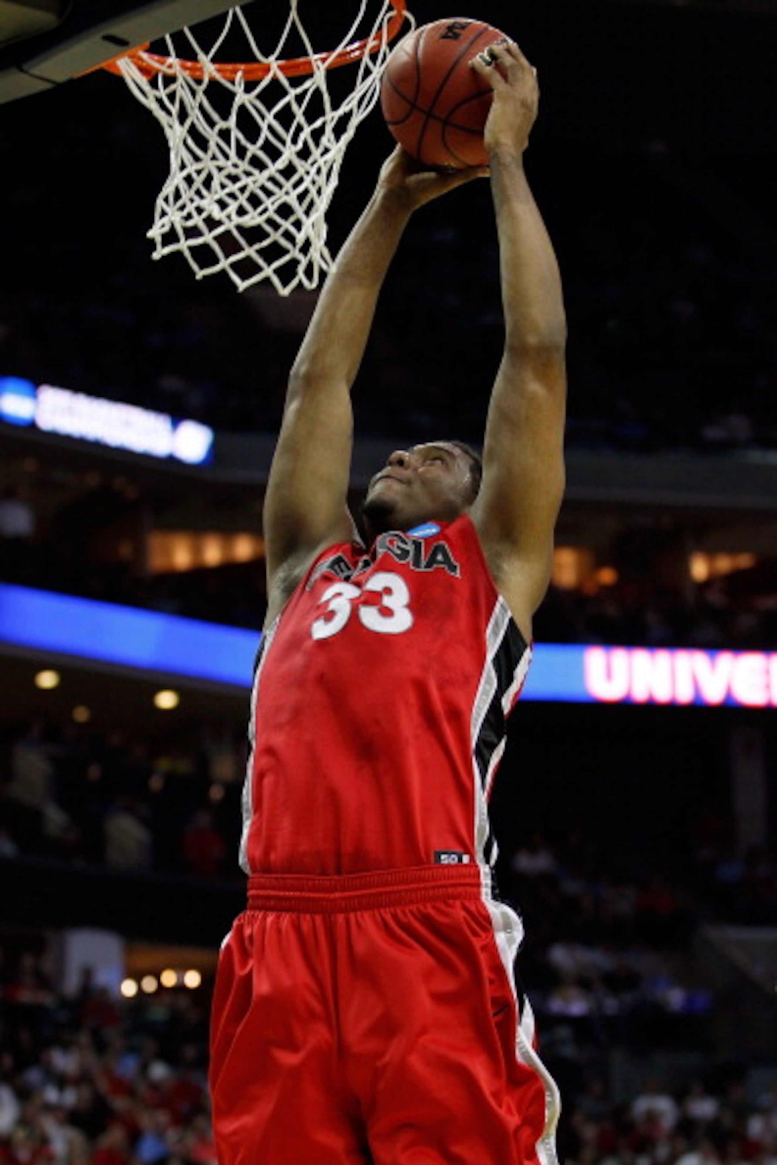 CHARLOTTE, NC - MARCH 18: Trey Thompkins #33 of the Georgia Bulldogs dunks the ball in the first half while taking on the Washington Huskies during the second round of the 2011 NCAA men's basketball tournament at Time Warner Cable Arena on March 18, 2011 CHARLOTTE, NC - MARCH 18: Trey Thompkins #33 of the Georgia Bulldogs dunks the ball in the first half while taking on the Washington Huskies during the second round of the 2011 NCAA men's basketball tournament at Time Warner Cable Arena on March 18, 2011