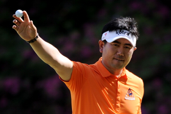 AUGUSTA, GA - APRIL 07:  Y.E. Yang of South Korea celebrates an eagle putt on the 13th green during the first round of the 2011 Masters Tournament at Augusta National Golf Club on April 7, 2011 in Augusta, Georgia.  (Photo by Harry How/Getty Images)