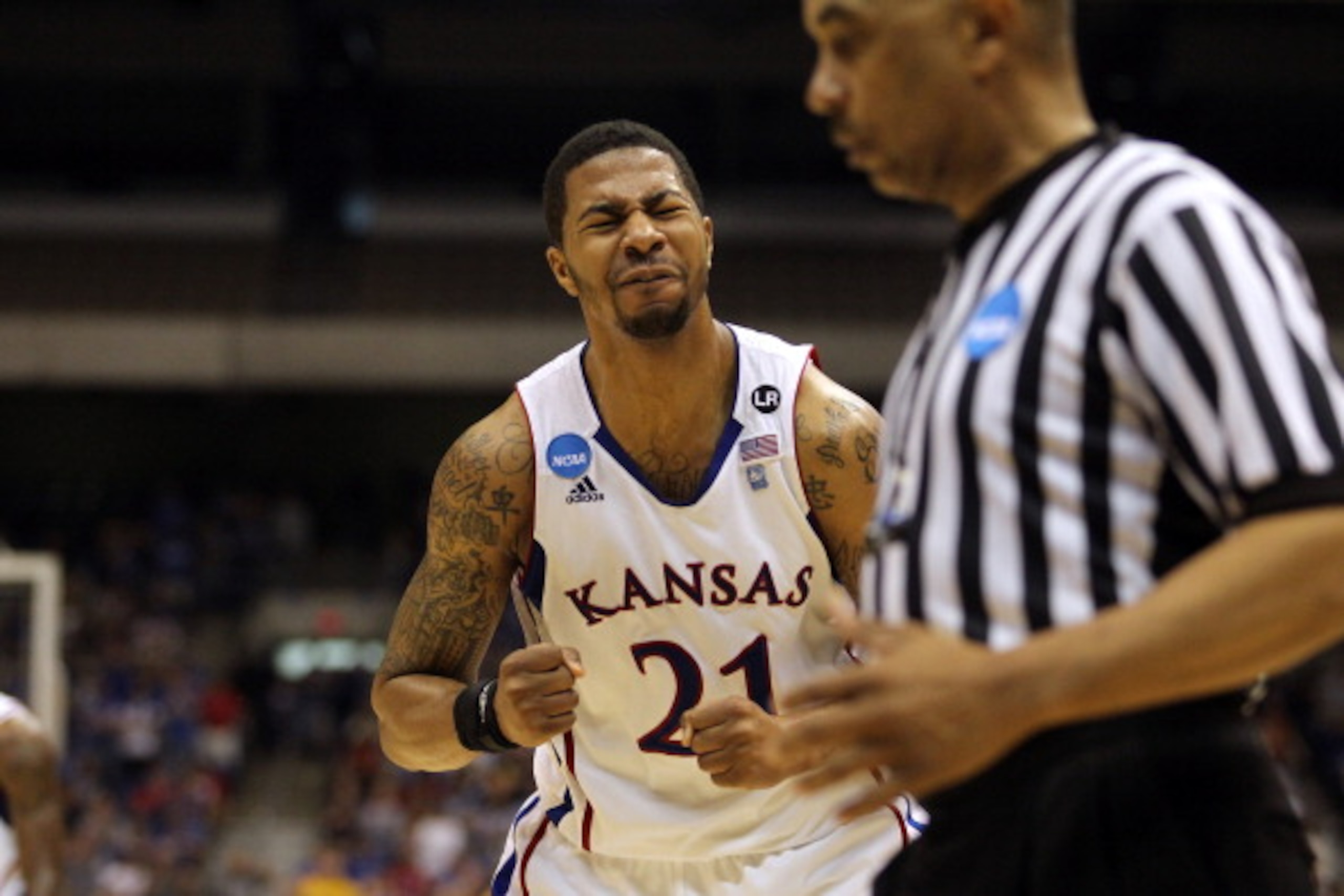 SAN ANTONIO, TX - MARCH 27: Markieff Morris #21 of the Kansas Jayhawks reacts during the southwest regional final of the 2011 NCAA men's basketball tournament against the Virginia Commonwealth Rams at the Alamodome on March 27, 2011 in San Antonio, Texas SAN ANTONIO, TX - MARCH 27: Markieff Morris #21 of the Kansas Jayhawks reacts during the southwest regional final of the 2011 NCAA men's basketball tournament against the Virginia Commonwealth Rams at the Alamodome on March 27, 2011 in San Antonio, Texas