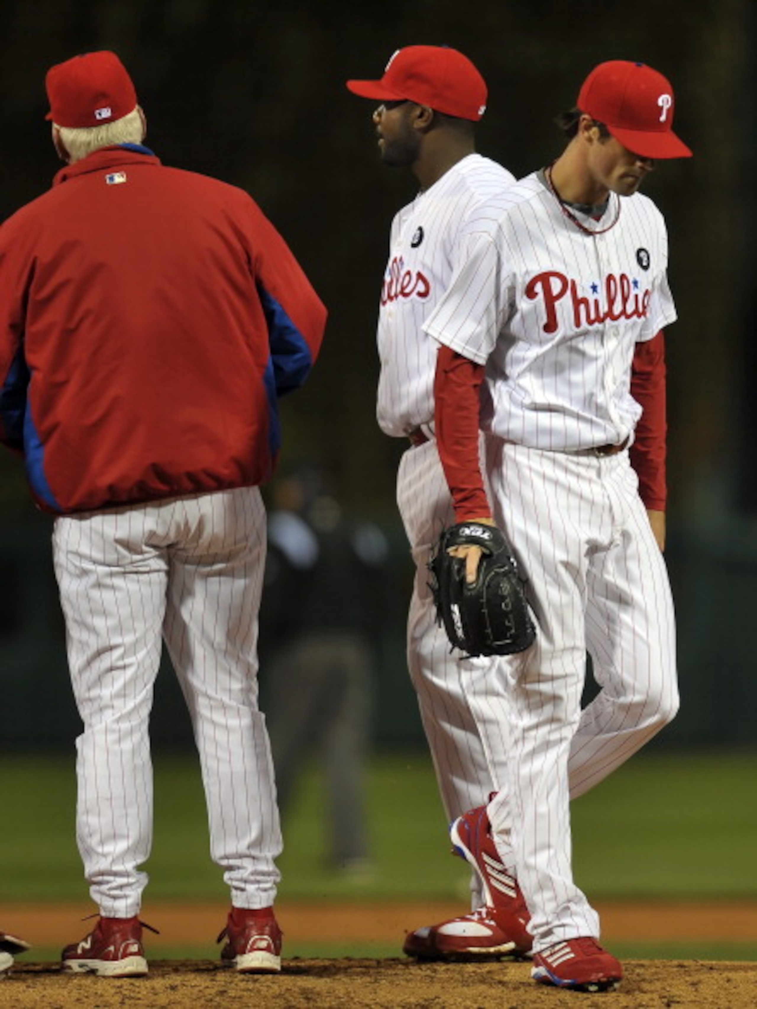 PHILADELPHIA, PA - APRIL 05: Starting pitcher Cole Hamels #35 of the Philadelphia Phillies walks from the mound after being pulled from the game by manager Charlie Manuel in the third inning during the game against the New York Mets at Citizens Bank Park 
