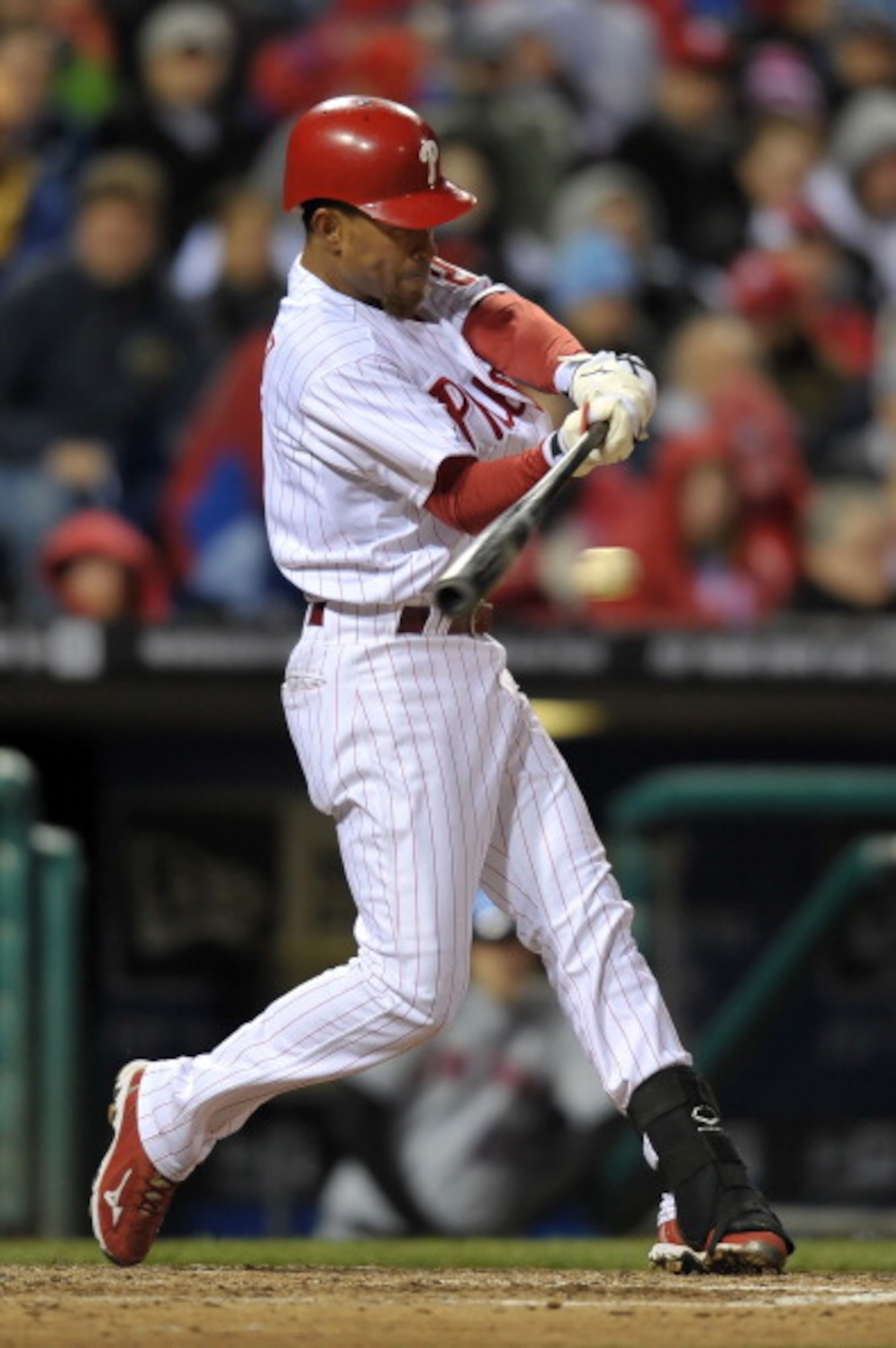PHILADELPHIA, PA - APRIL 05: Wilson Valdez #21 of the Philadelphia Phillies hits a single during the game against the New York Mets at Citizens Bank Park on April 5, 2011 in Philadelphia, Pennsylvania. The Mets won 7-1. (Photo by Drew Hallowell/Getty Imag