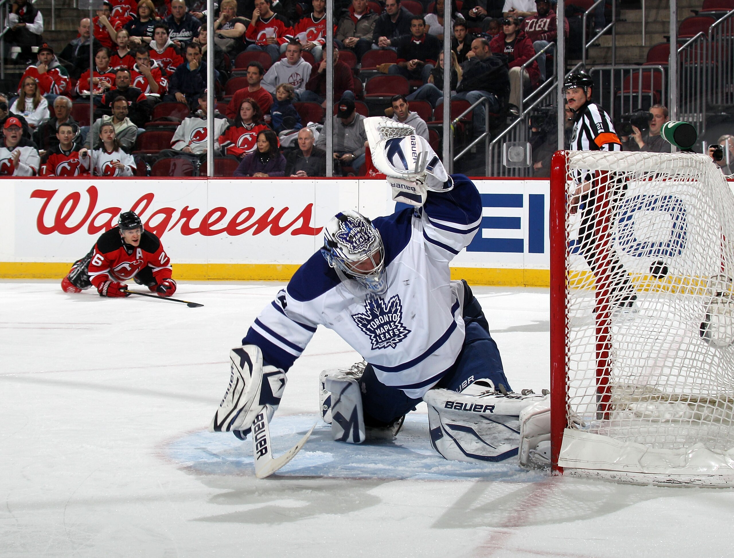 NEWARK, NJ - APRIL 06: A shot by Mattias Tedenby #21 of the New Jersey Devils (not shown) eludes James Reimer #34 of the Toronto Maple Leafs at 14:29 of the second period at the Prudential Center on April 6, 2011 in Newark, New Jersey.  (Photo by Bruce Be