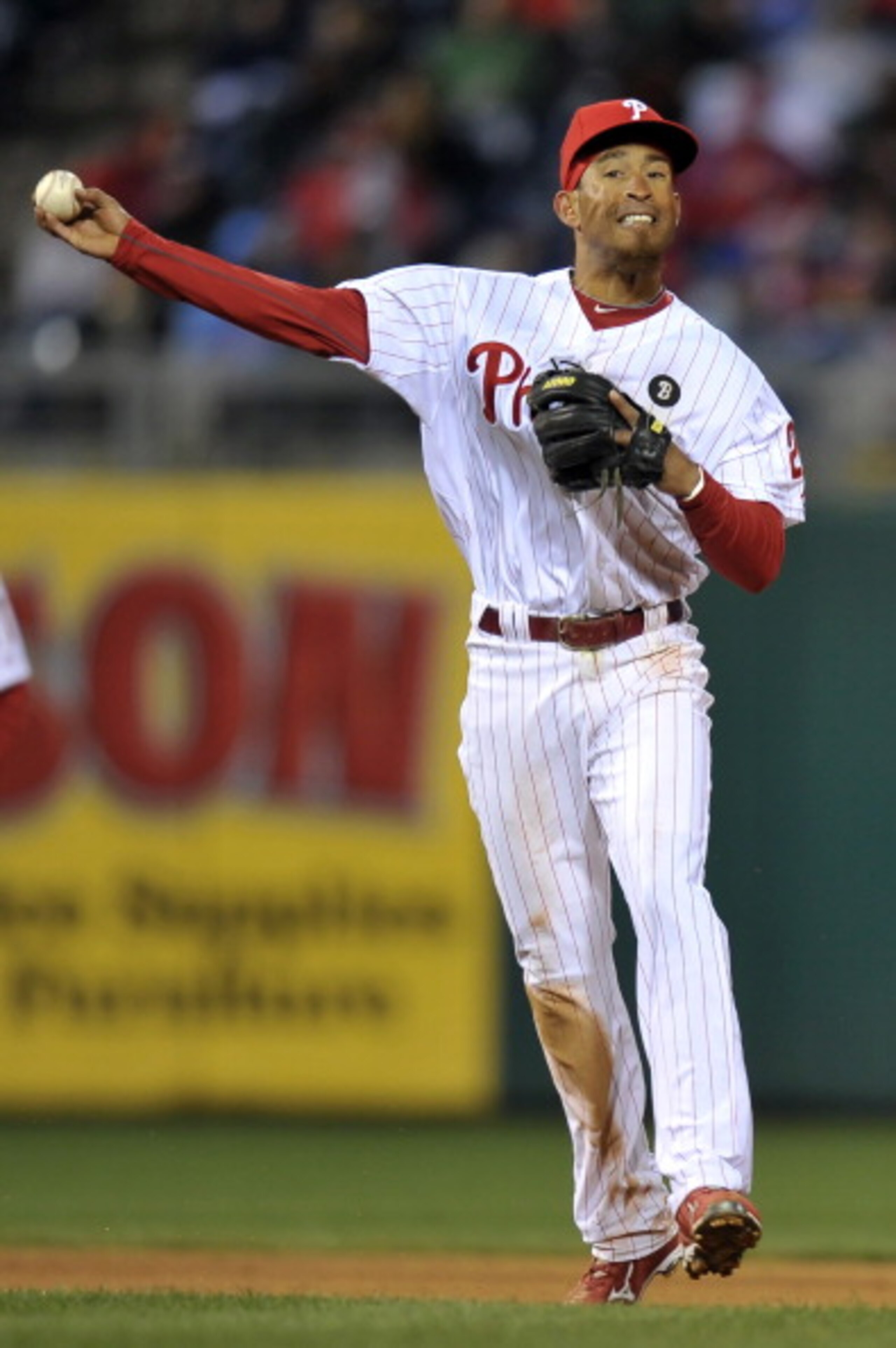 PHILADELPHIA, PA - APRIL 05: Wilson Valdez #21 of the Philadelphia Phillies make a throw to first base during the game against the New York Mets at Citizens Bank Park on April 5, 2011 in Philadelphia, Pennsylvania. The Mets won 7-1. (Photo by Drew Hallowe